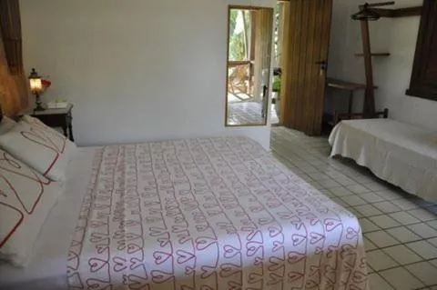 Bed in Pousada Girassol