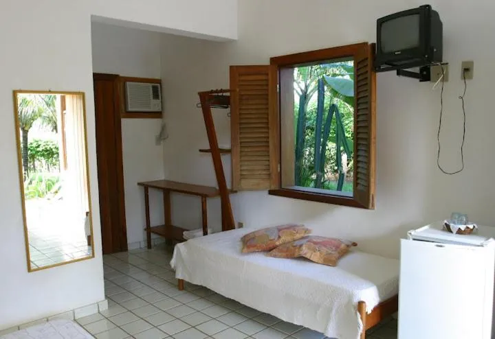 Bed in Pousada Girassol