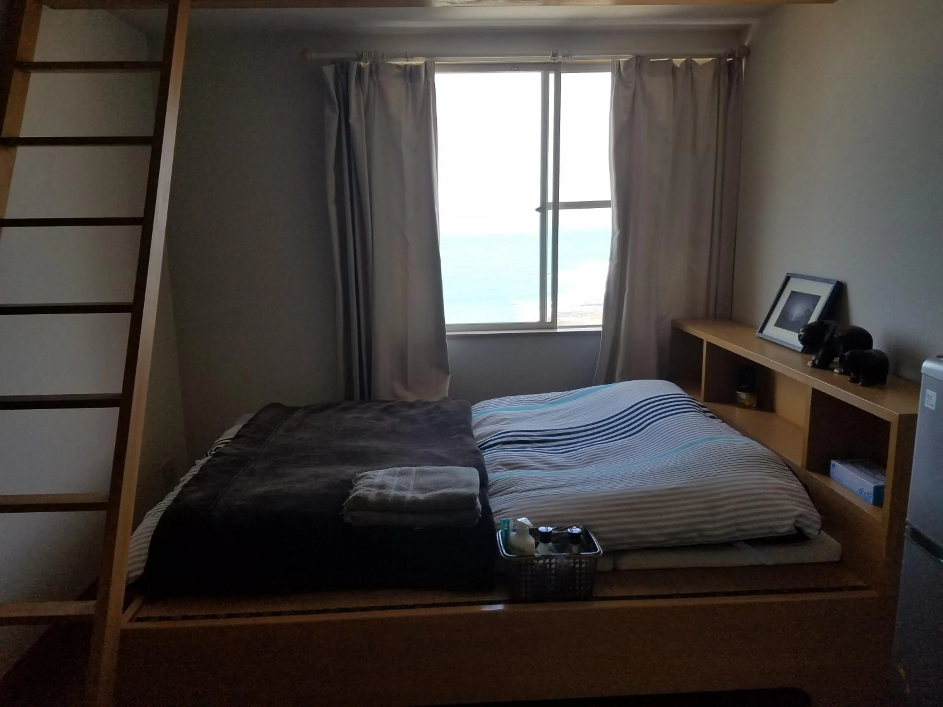 Bed in Ocean Home Guest House