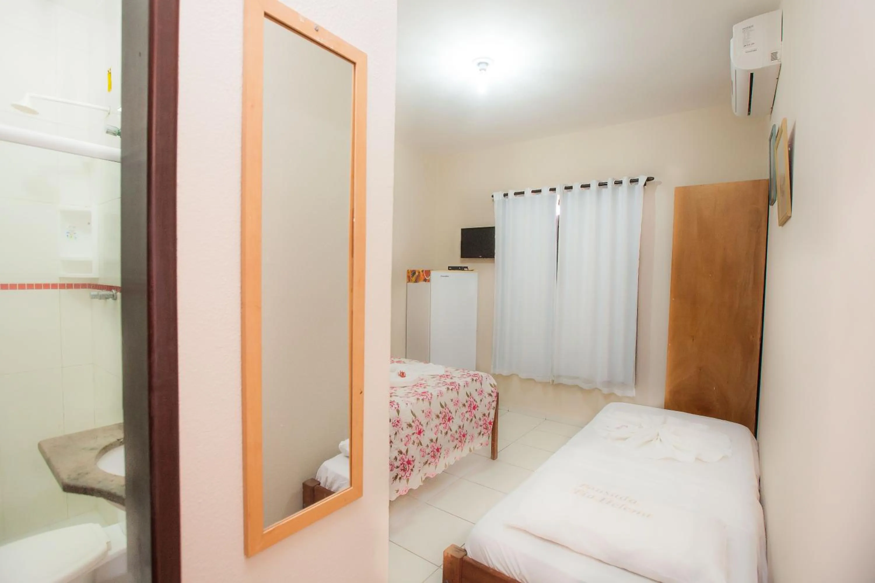 Bed in Pousada Tia Helena