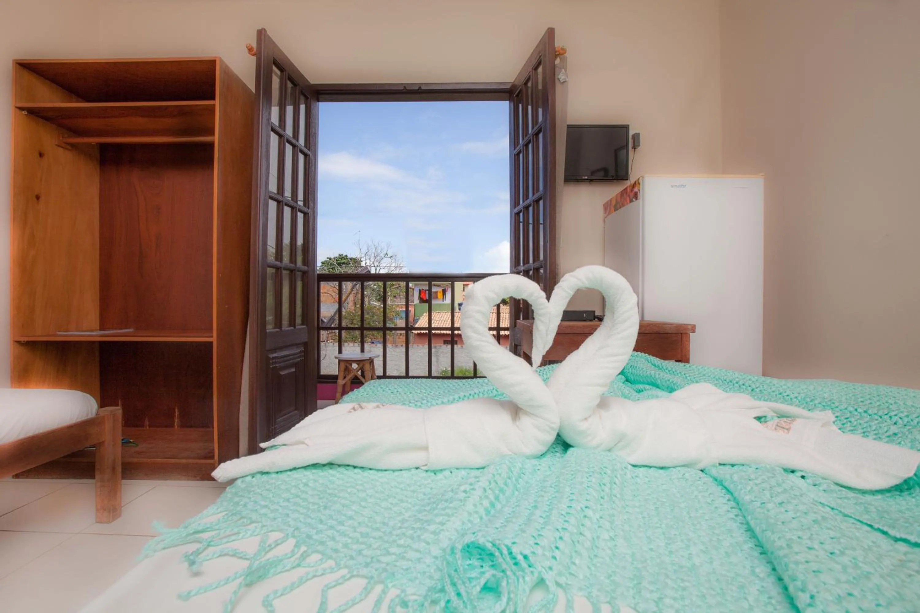 Bed in Pousada Tia Helena