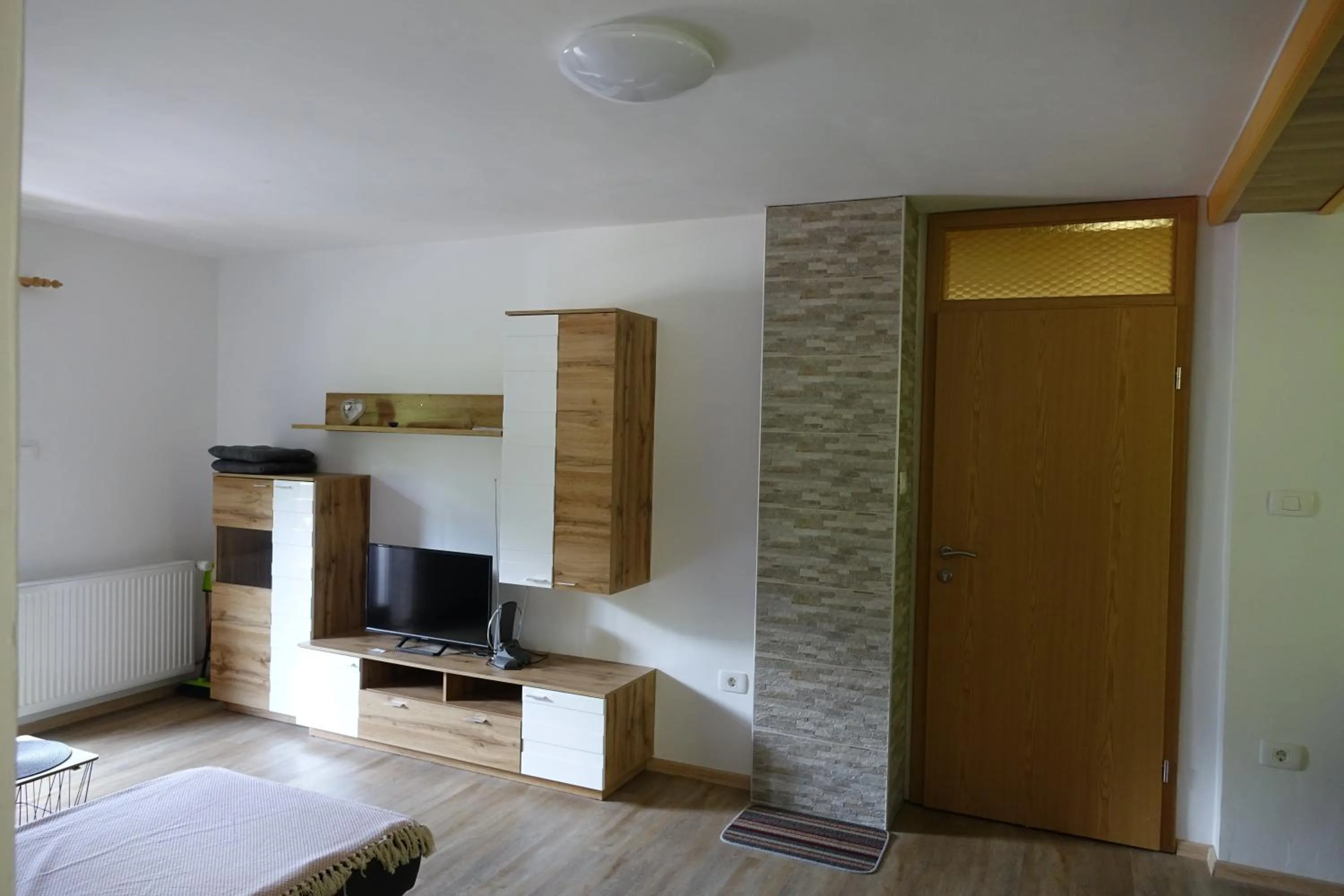 Living room, Bed in BOOA Rooms Irena