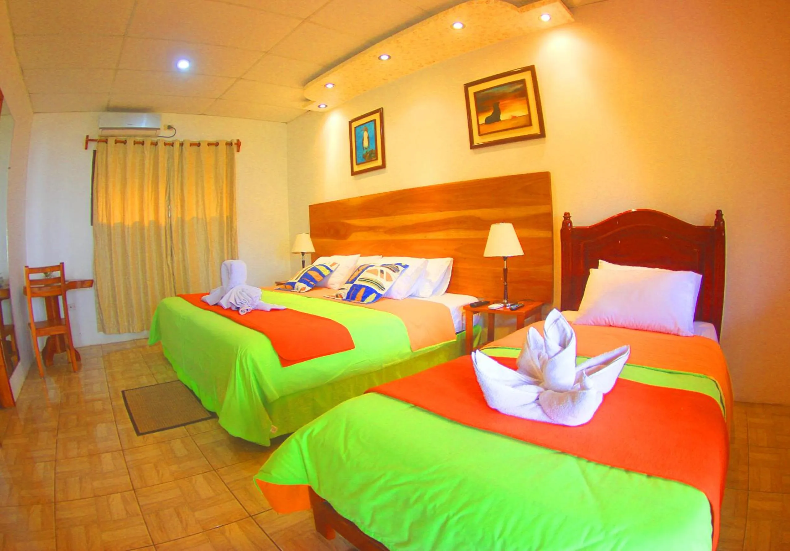 Bed in Hotel Twin Galápagos