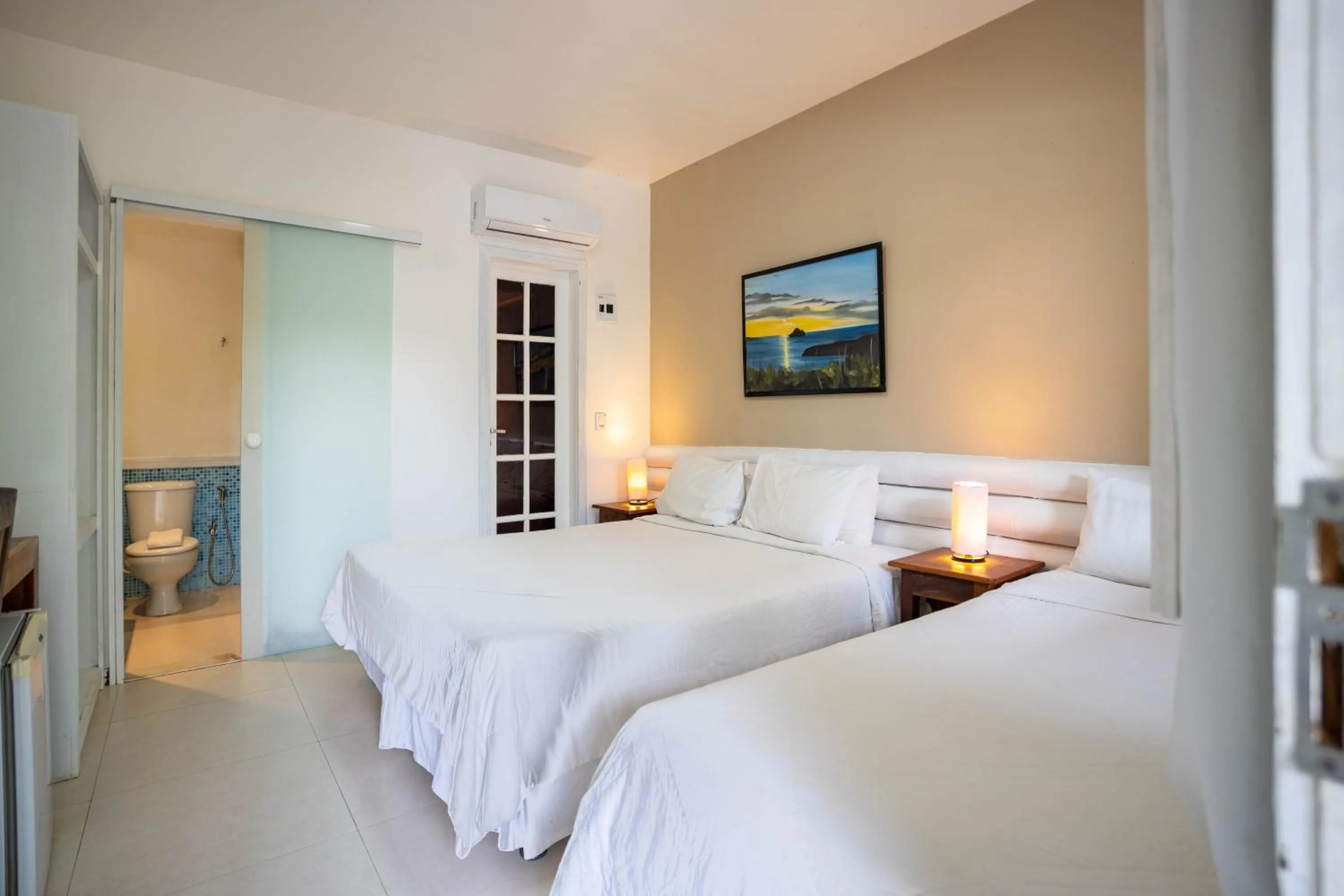 Bed in Pousada Vila Pitanga