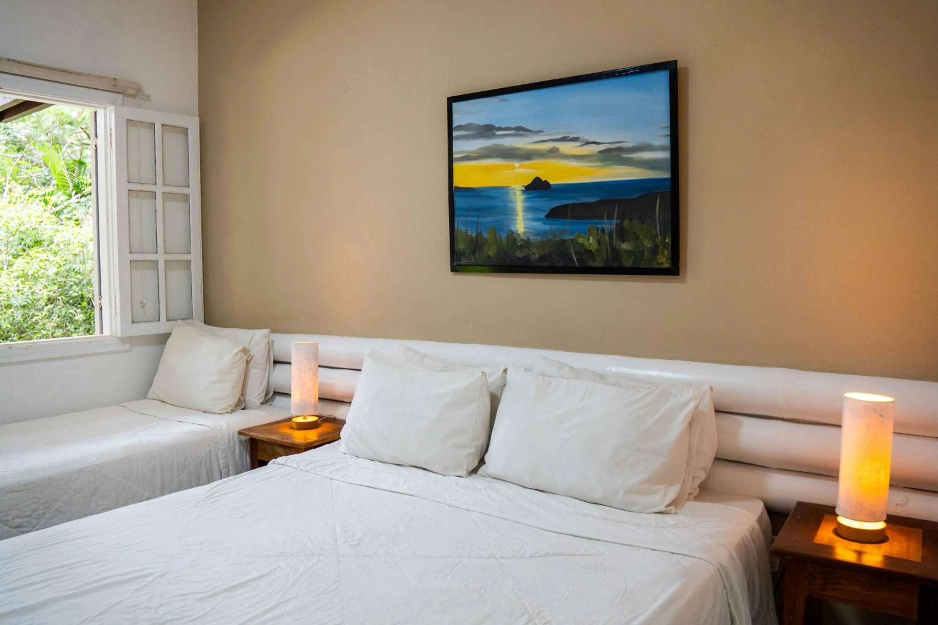 Bed in Pousada Vila Pitanga