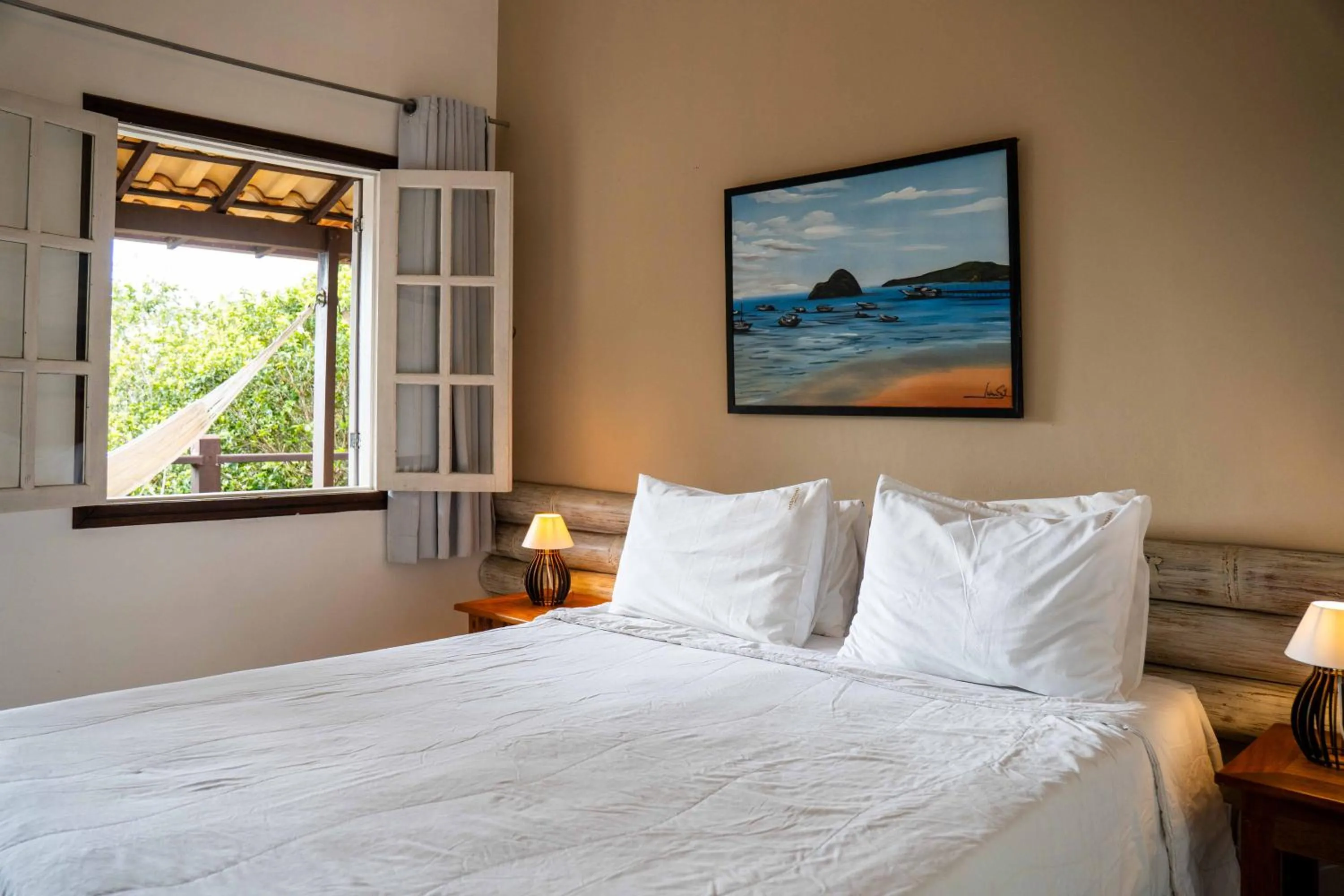 Bed in Pousada Vila Pitanga