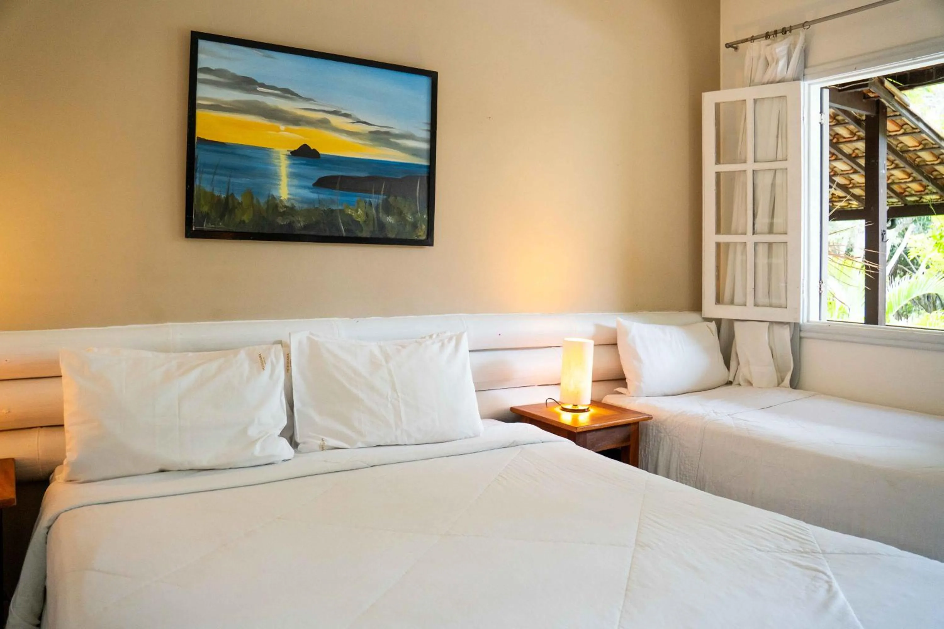 Bed in Pousada Vila Pitanga