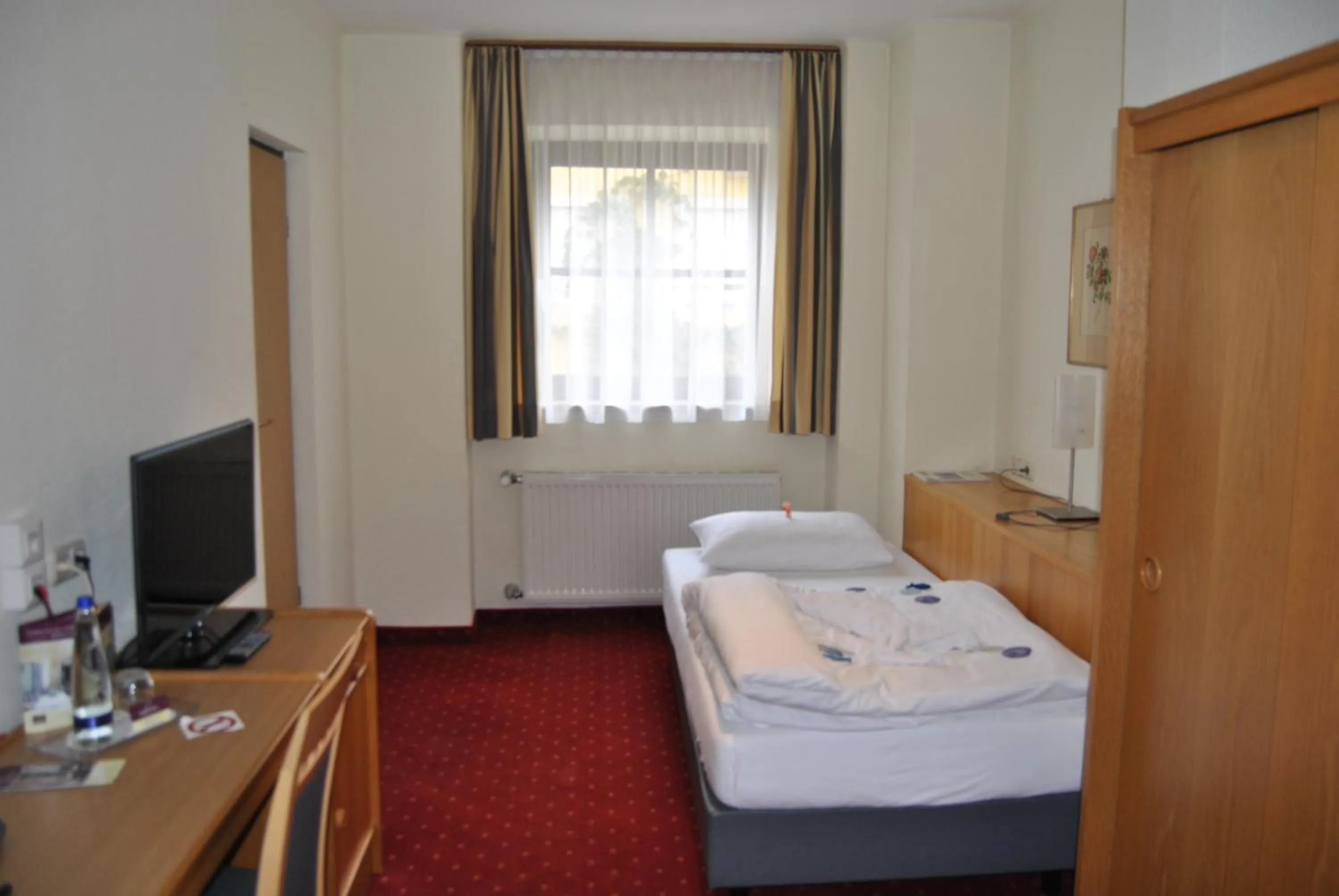 Photo of the whole room, Bed in Lodner Hotel Drei Mohren