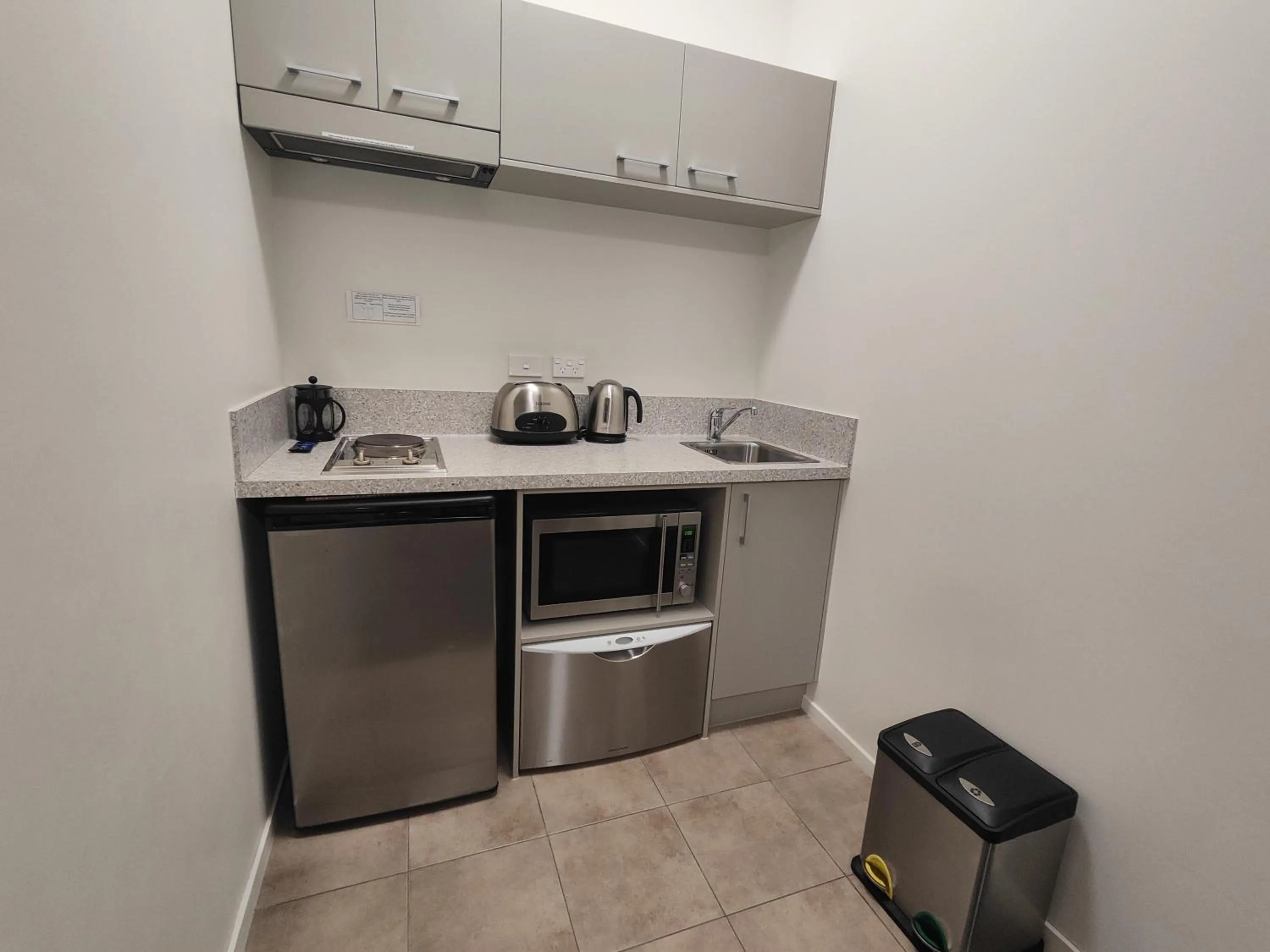 Kitchen or kitchenette in Quest New Plymouth CBD Apartment Hotel