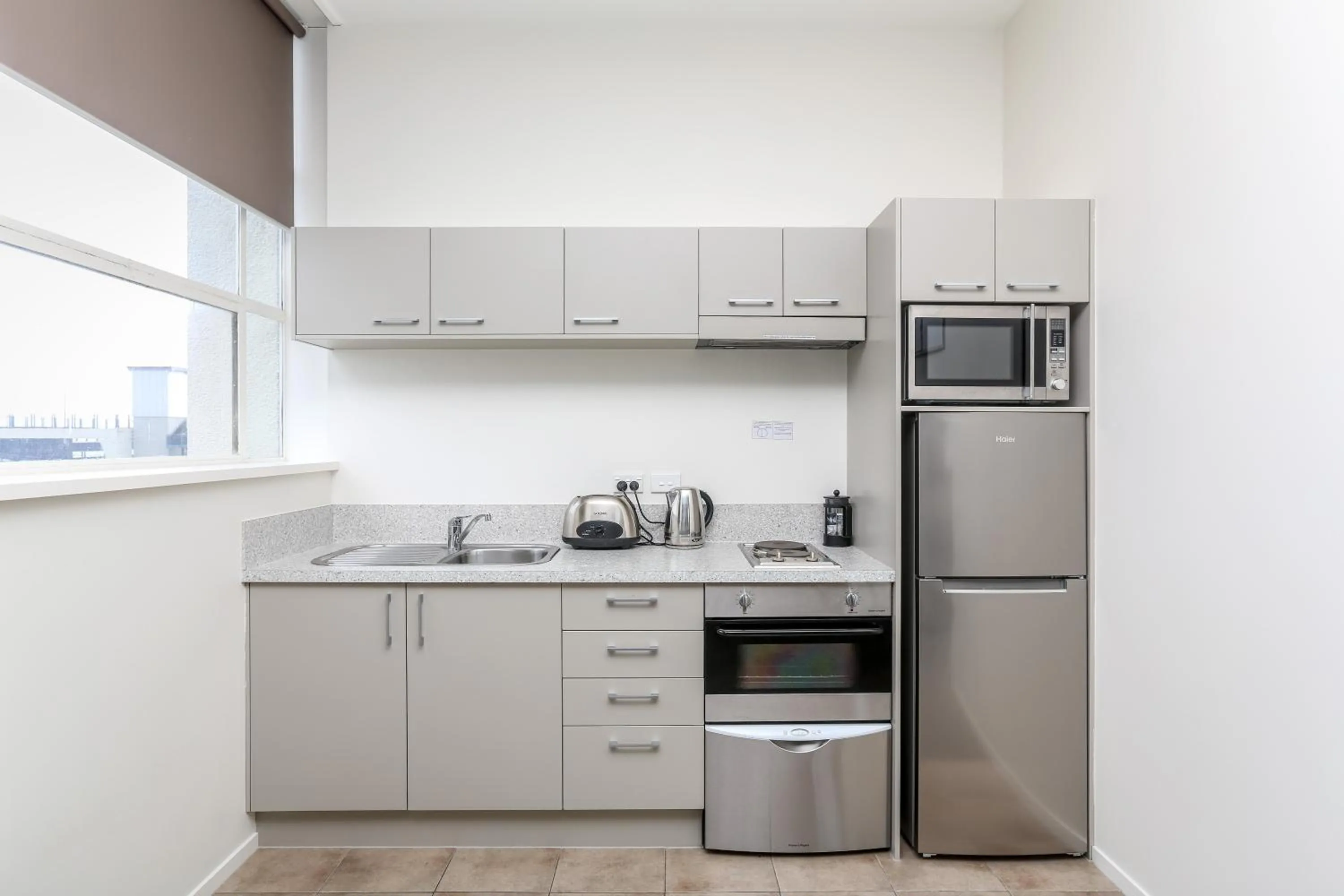 kitchen in Quest New Plymouth CBD Apartment Hotel