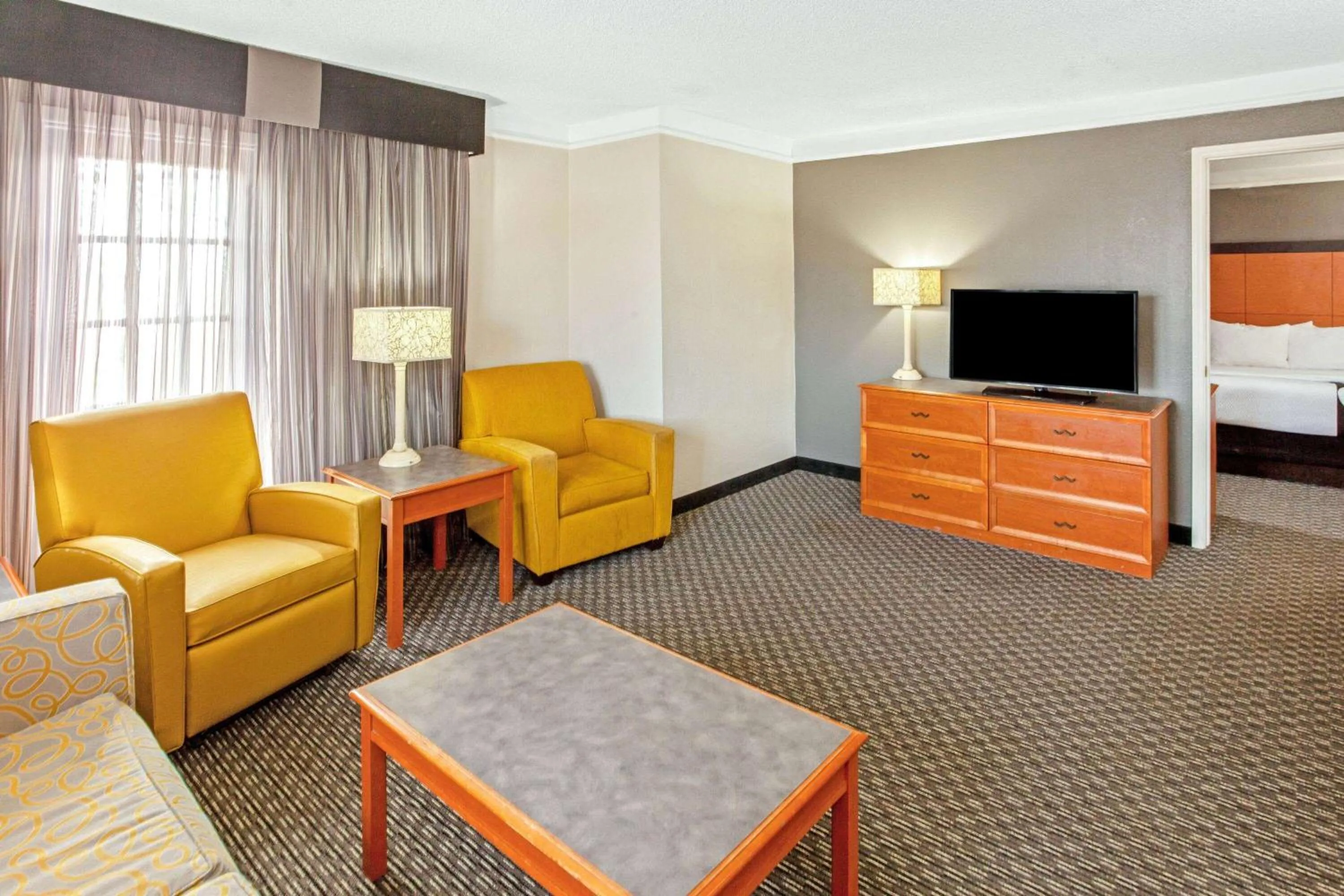 Photo of the whole room, Seating Area in La Quinta Inn by Wyndham Wichita Falls Event Center North