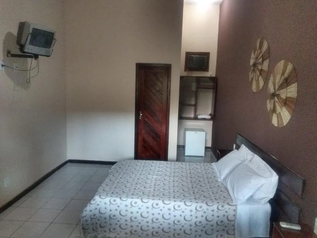 Bed in Pousada Portal do Sol