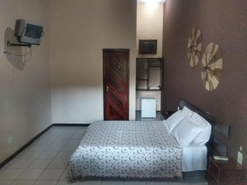 Bed in Pousada Portal do Sol