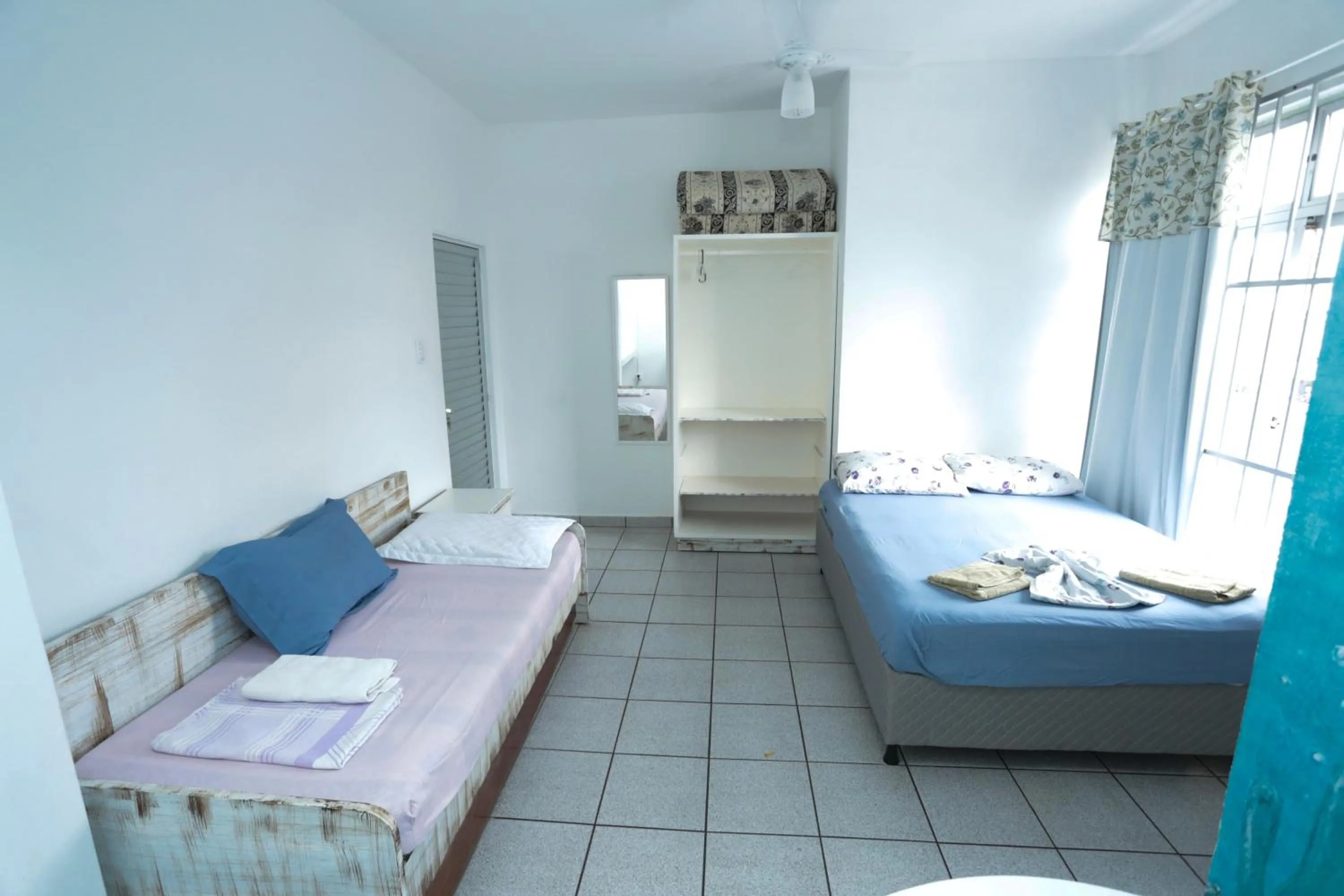 Bed in Pousada Centralmar