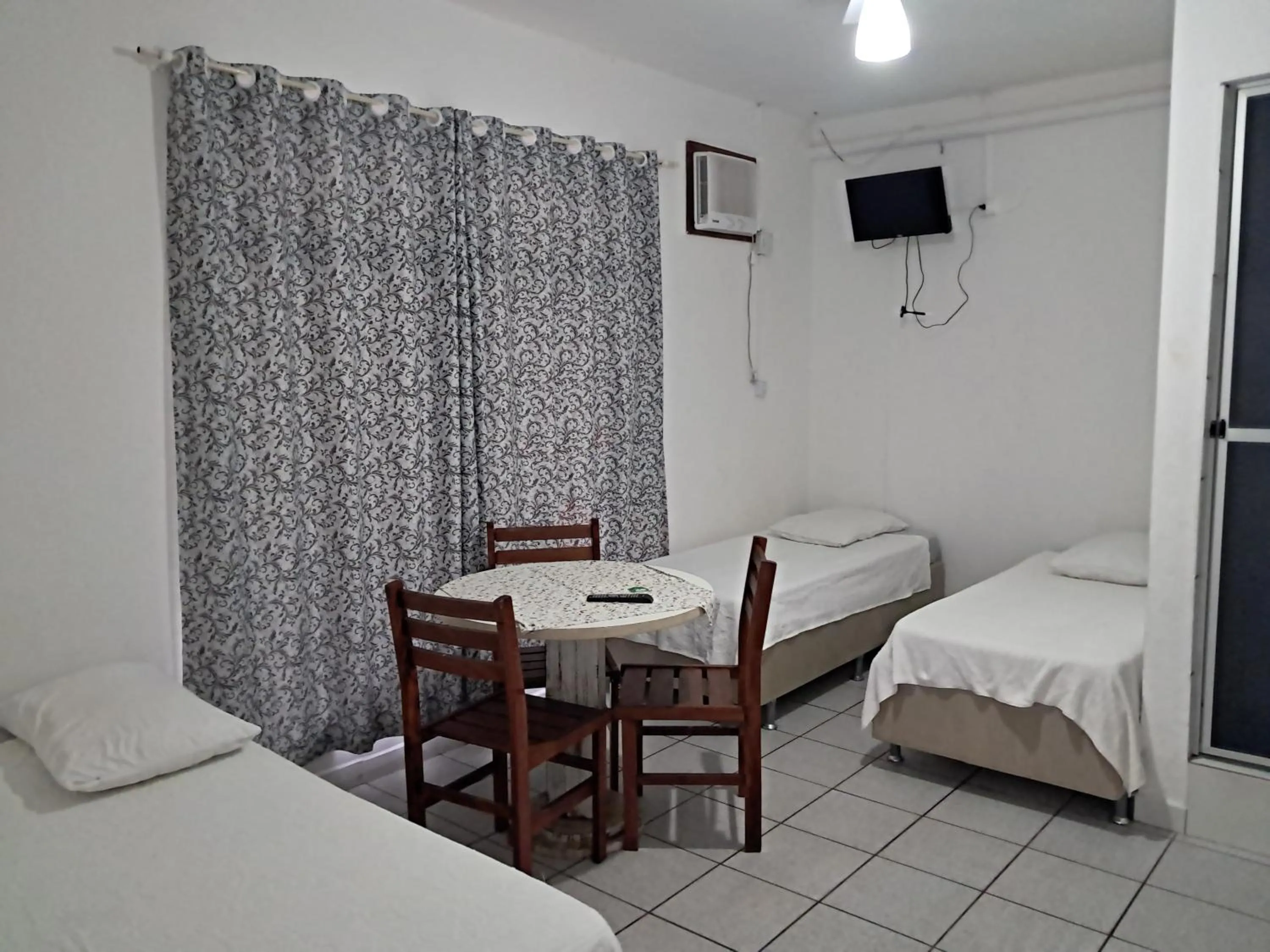 Bed in Pousada Centralmar
