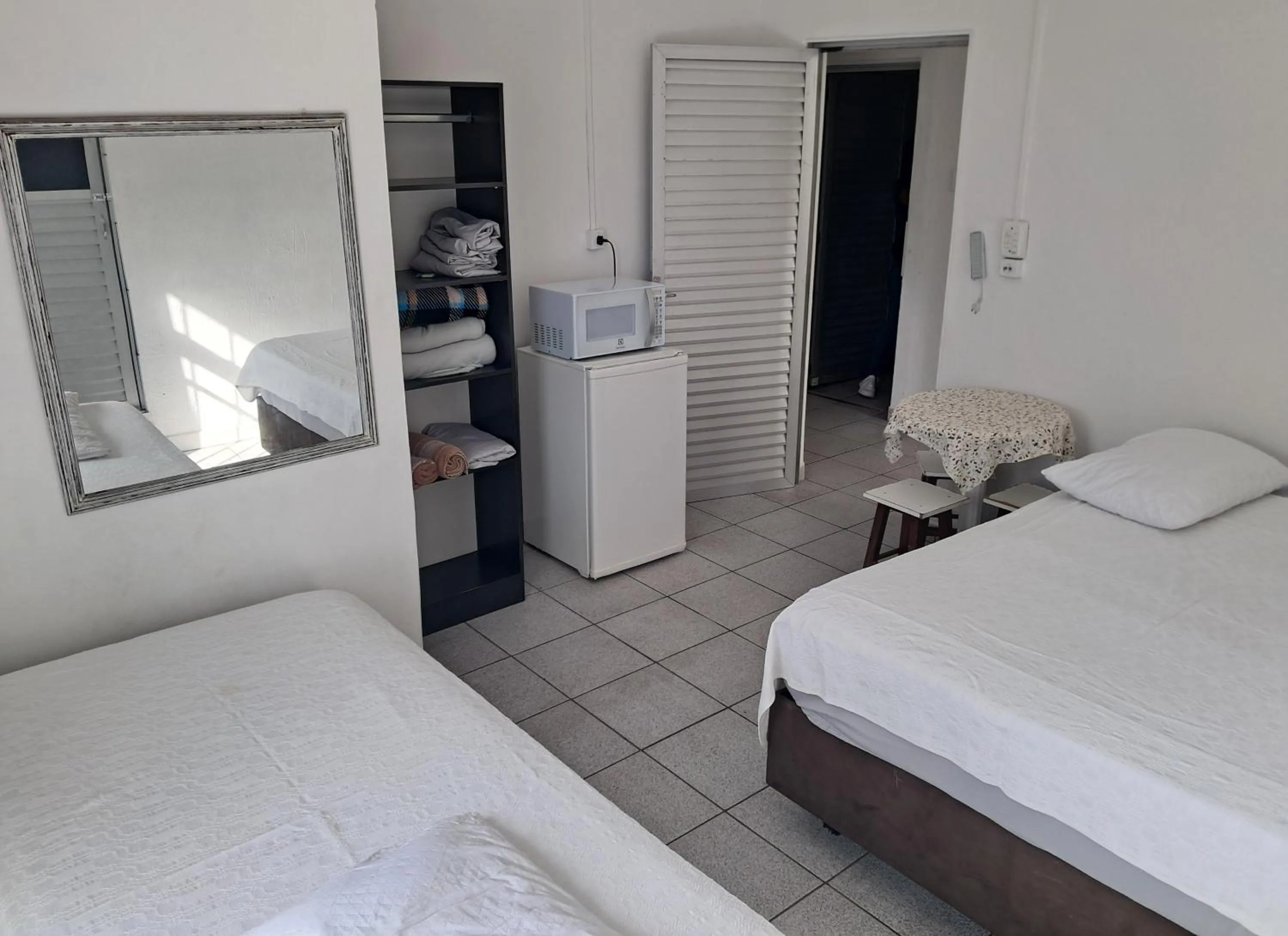 Bed in Pousada Centralmar
