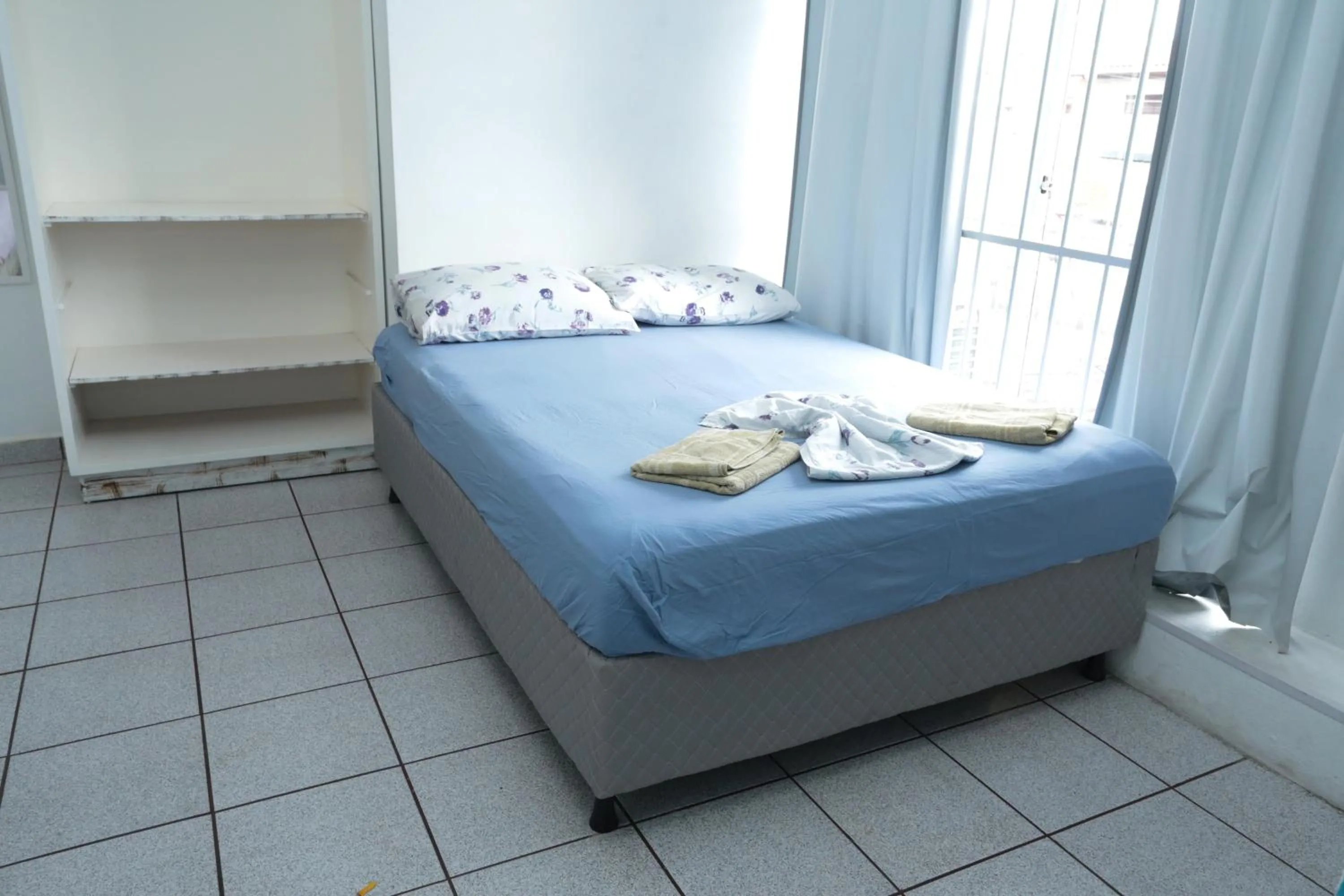 Bed in Pousada Centralmar