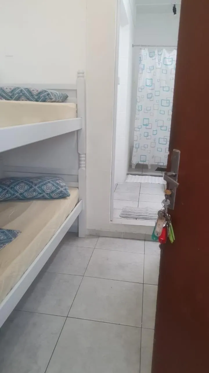 Bed in Pousada Centralmar