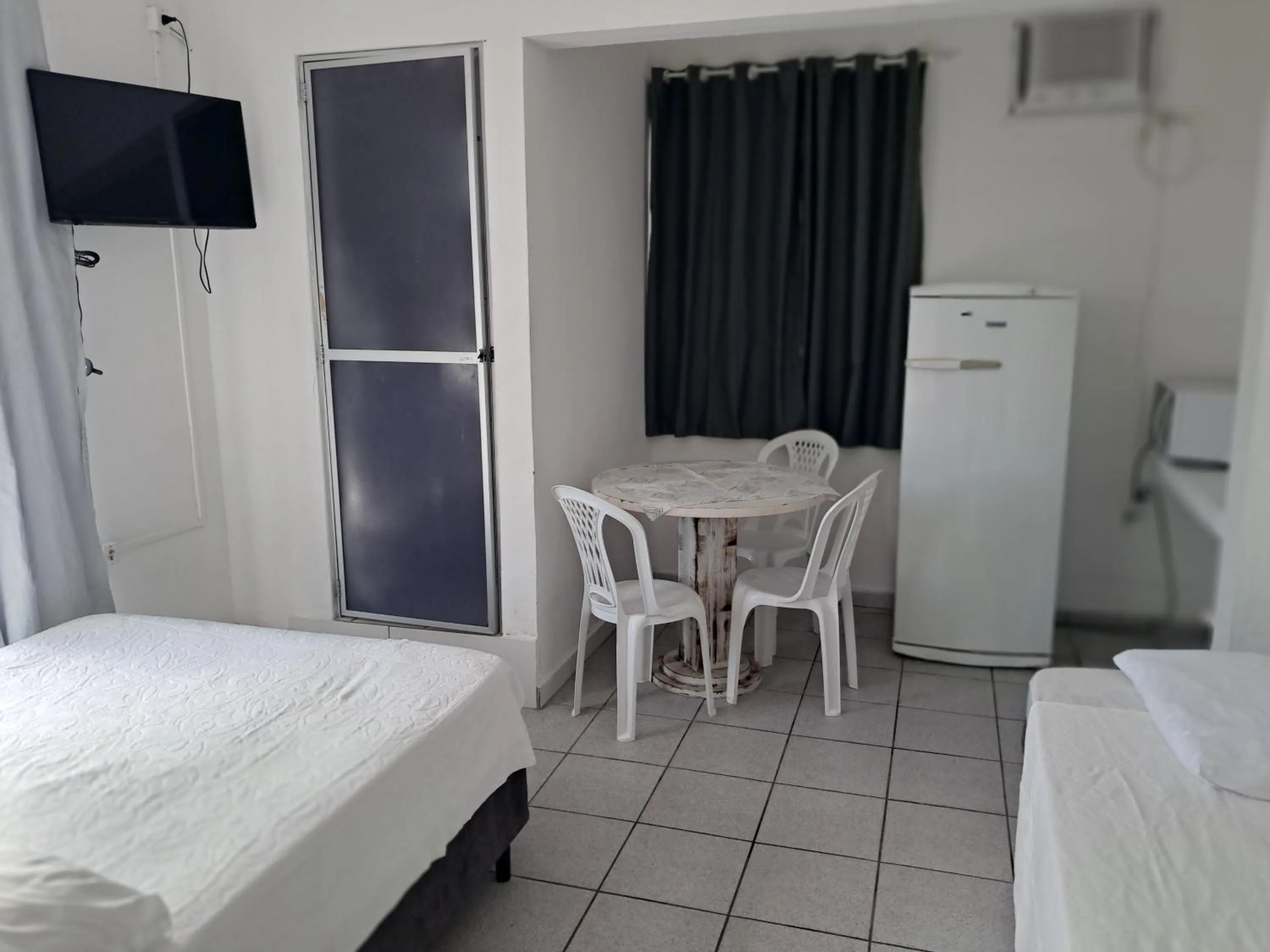 TV and multimedia, Bed in Pousada Centralmar