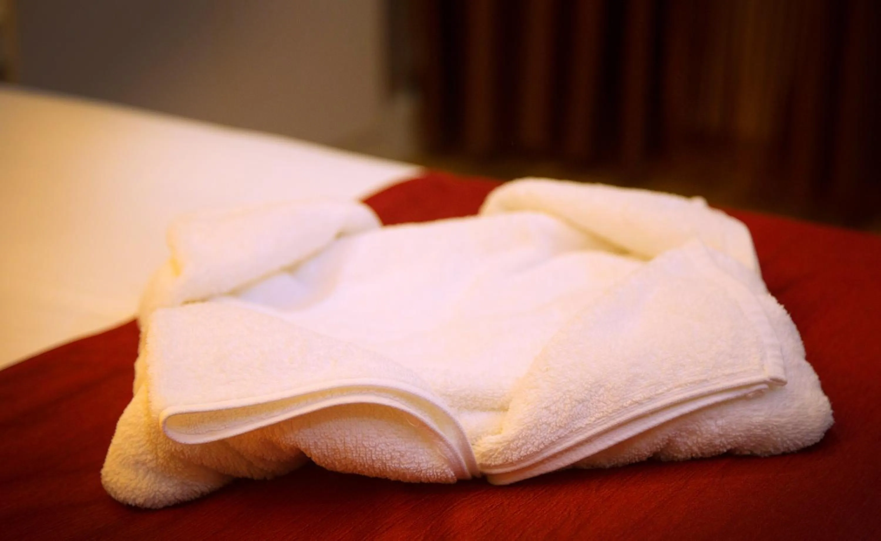 Bed in Hotel Wayanad Square