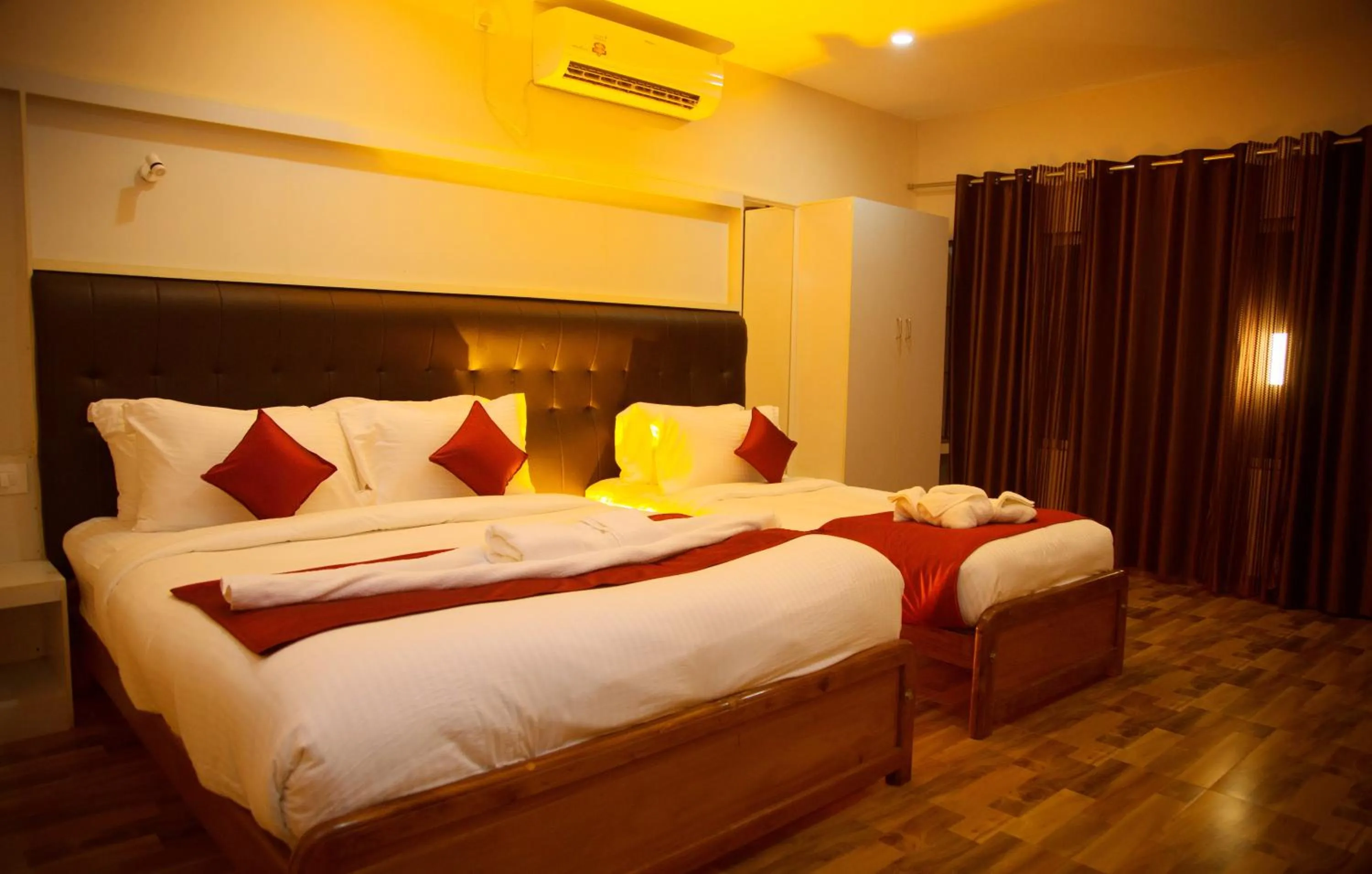 Photo of the whole room, Bed in Hotel Wayanad Square