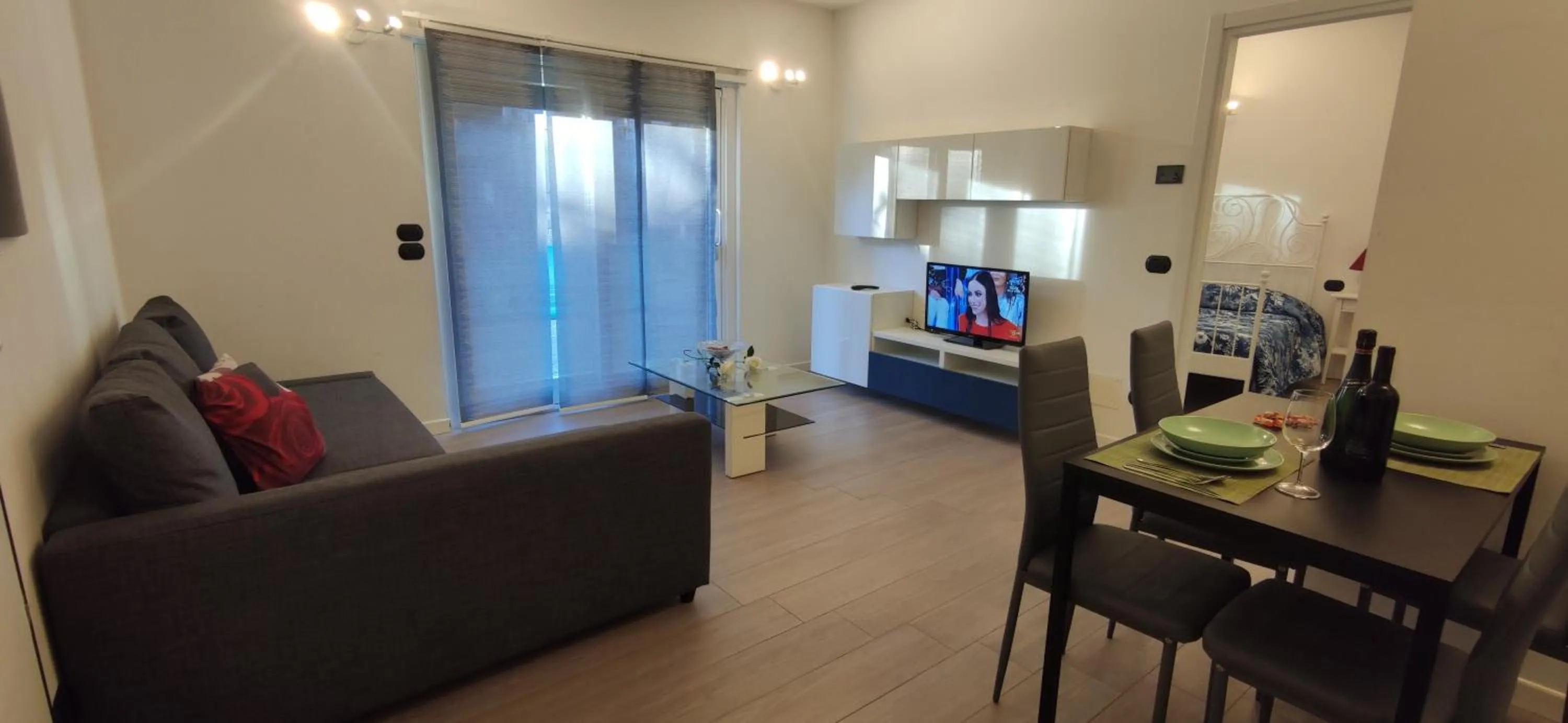 Communal lounge/ TV room in Hotel Residence Alessandra