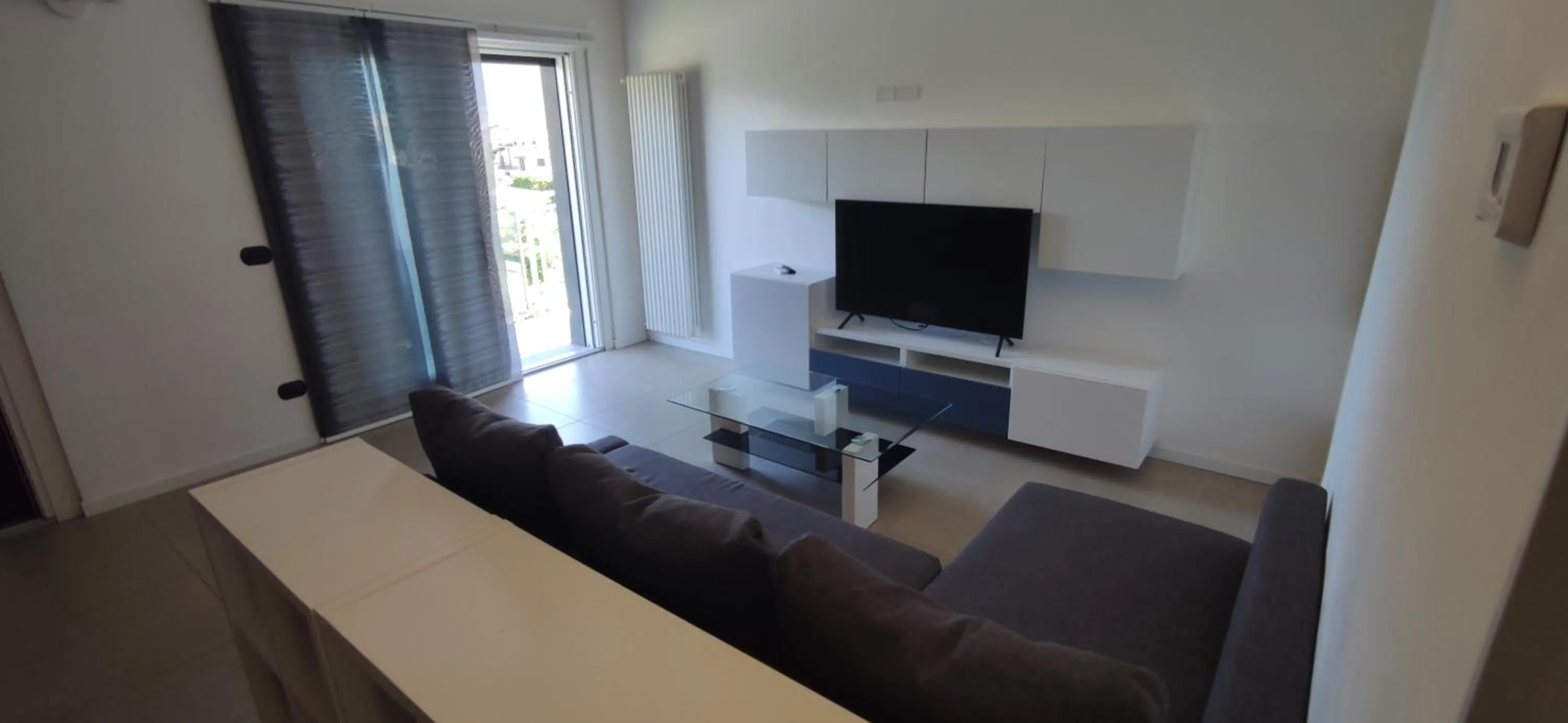 Communal lounge/ TV room in Hotel Residence Alessandra