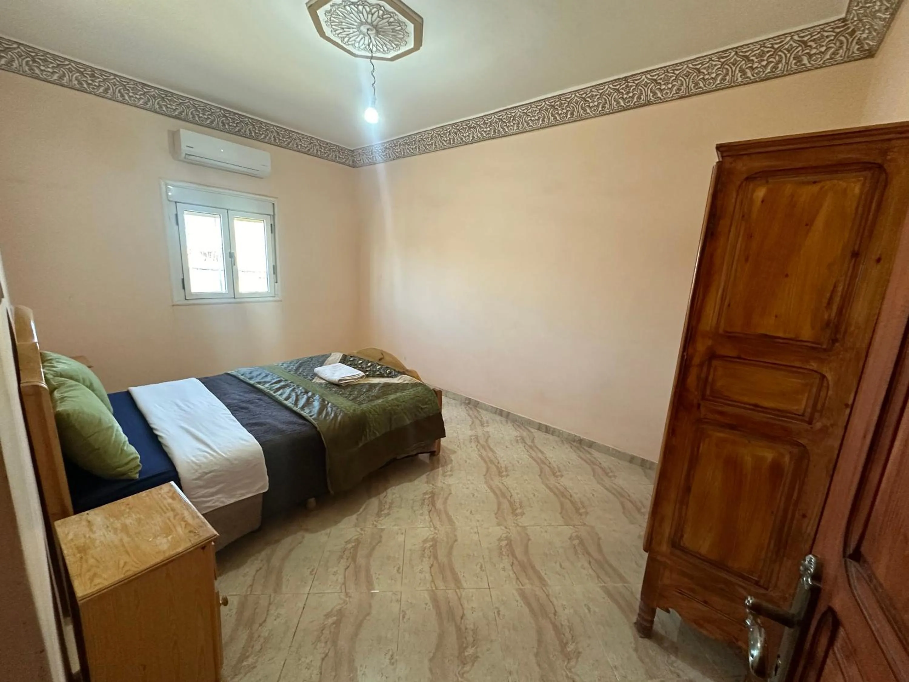 Bed in Merzouga desert apartment