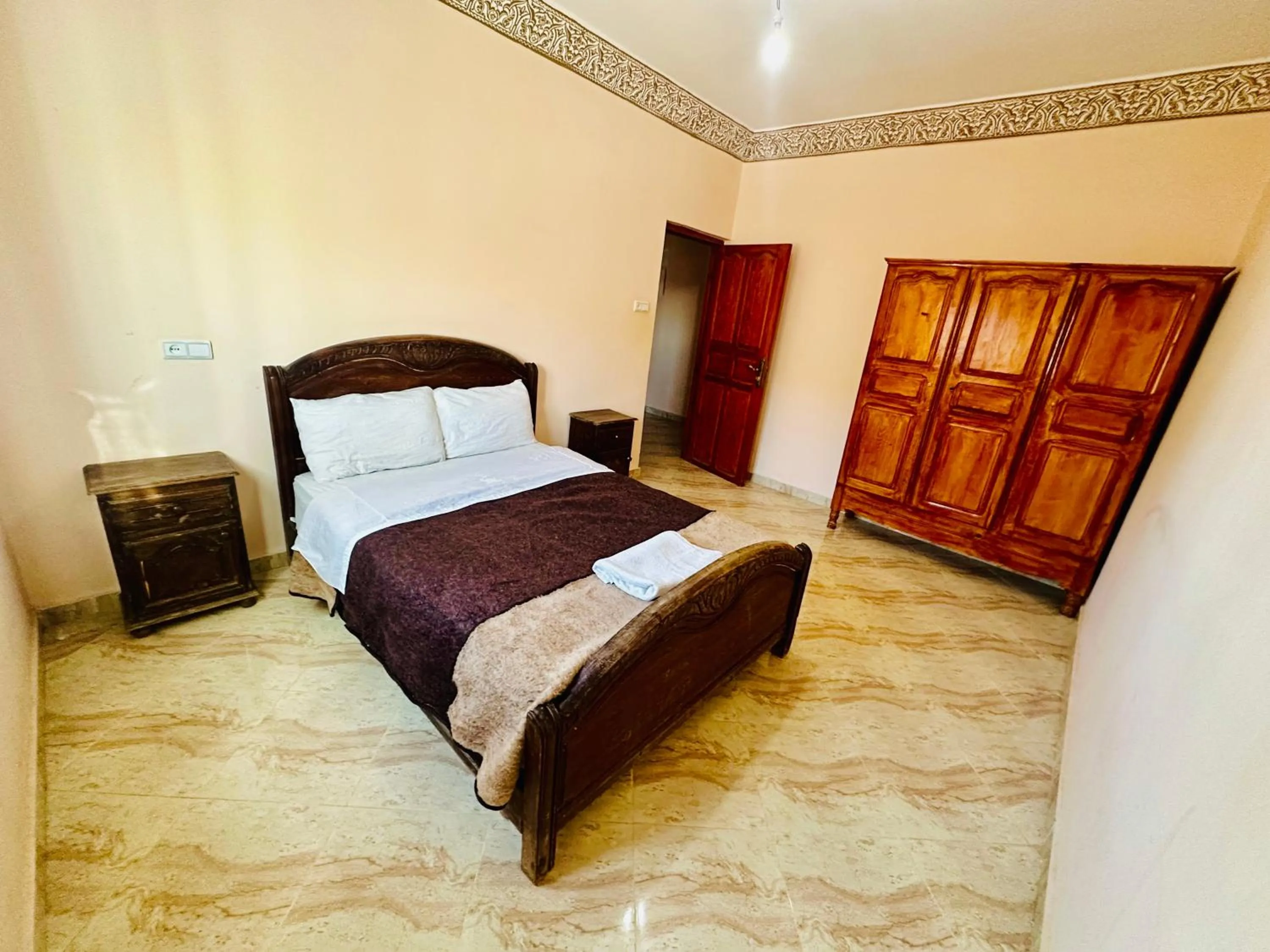 Bed in Merzouga desert apartment