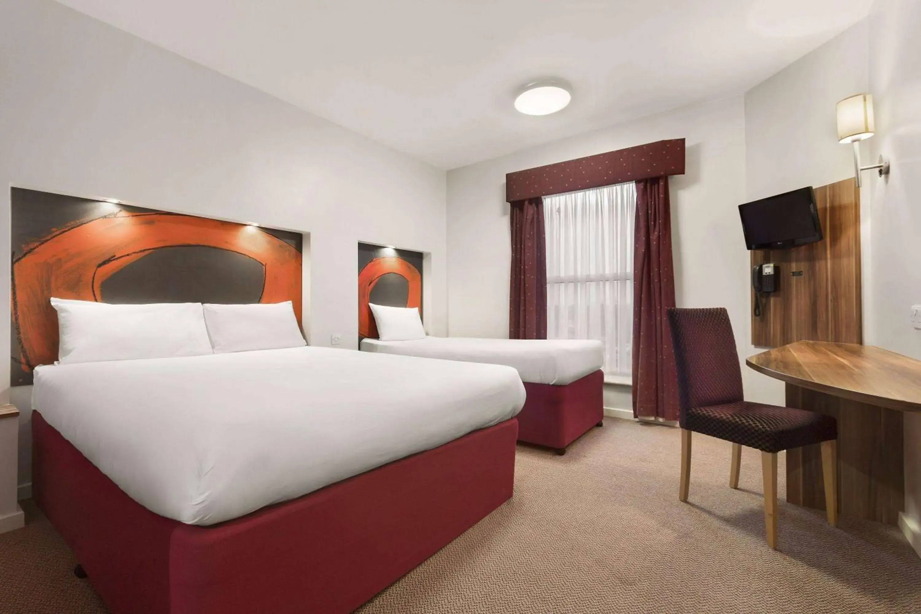 Photo of the whole room, Bed in Ramada London Stansted Airport Photo of the whole room, Bed in Ramada London Stansted Airport