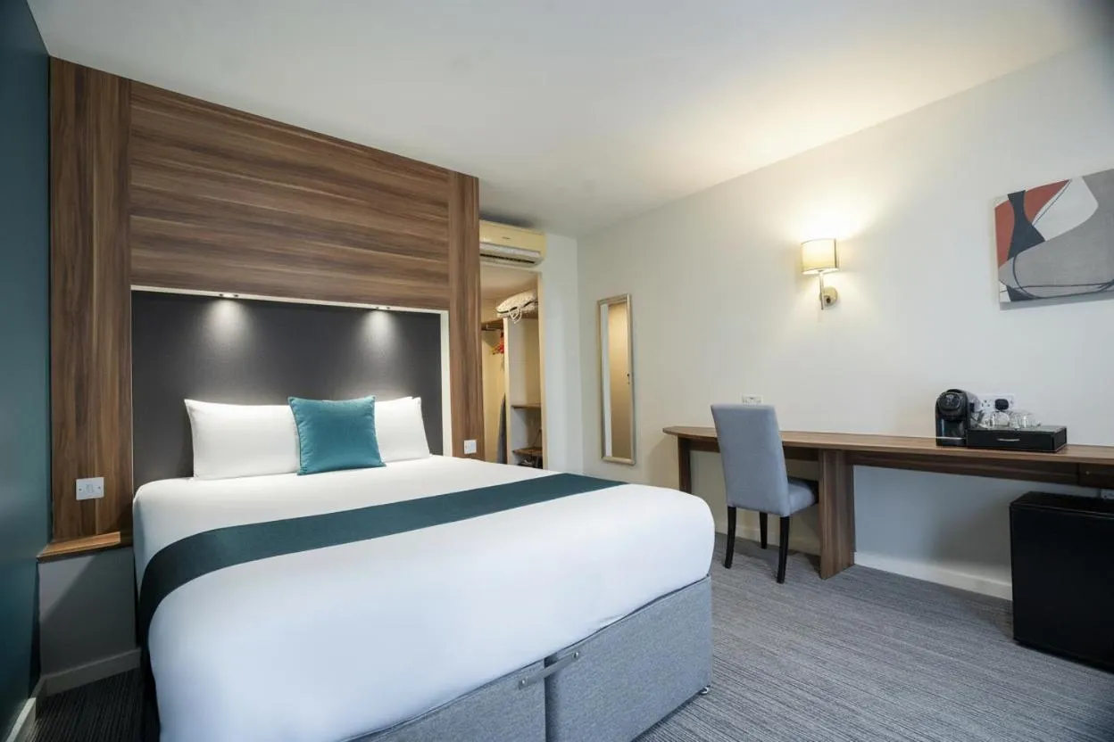 Bed in Ramada London Stansted Airport