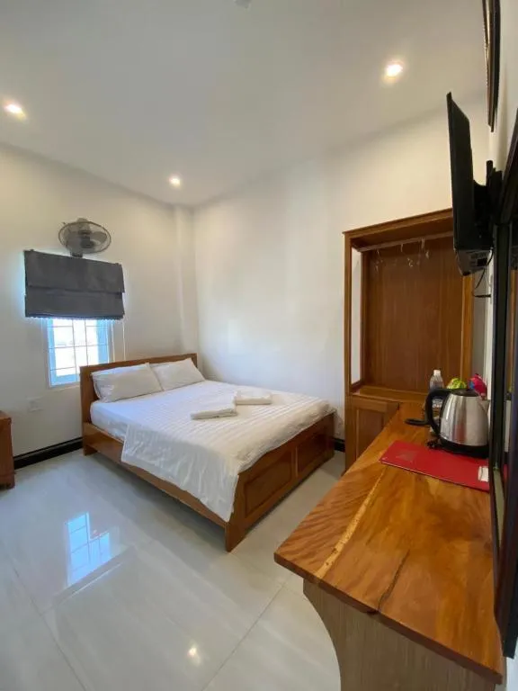 Bed in Queen Hotel