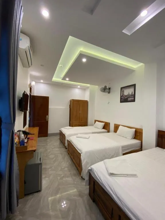 Bed in Queen Hotel