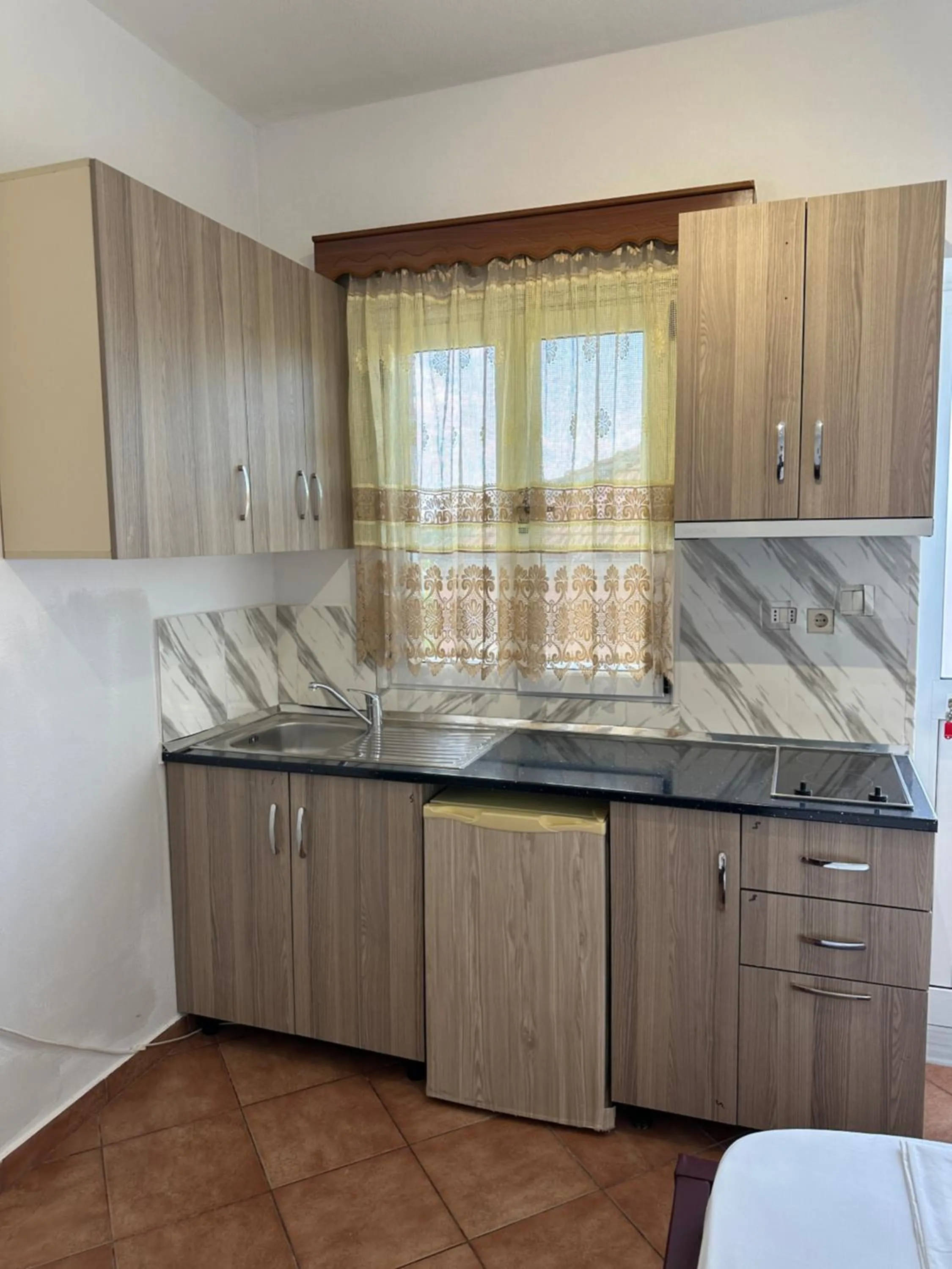 Kitchen or kitchenette in Anel Suites