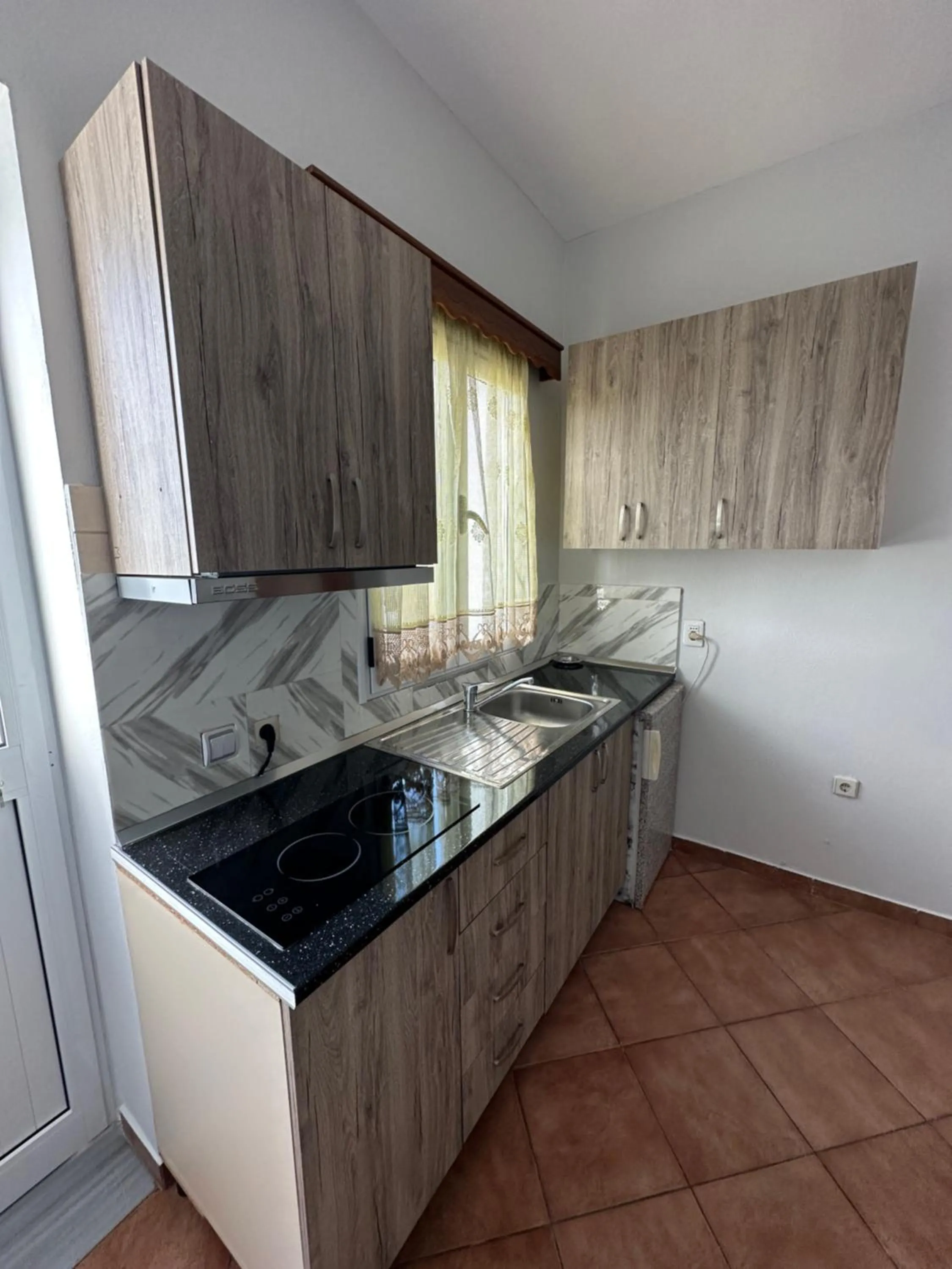 Kitchen or kitchenette in Anel Suites