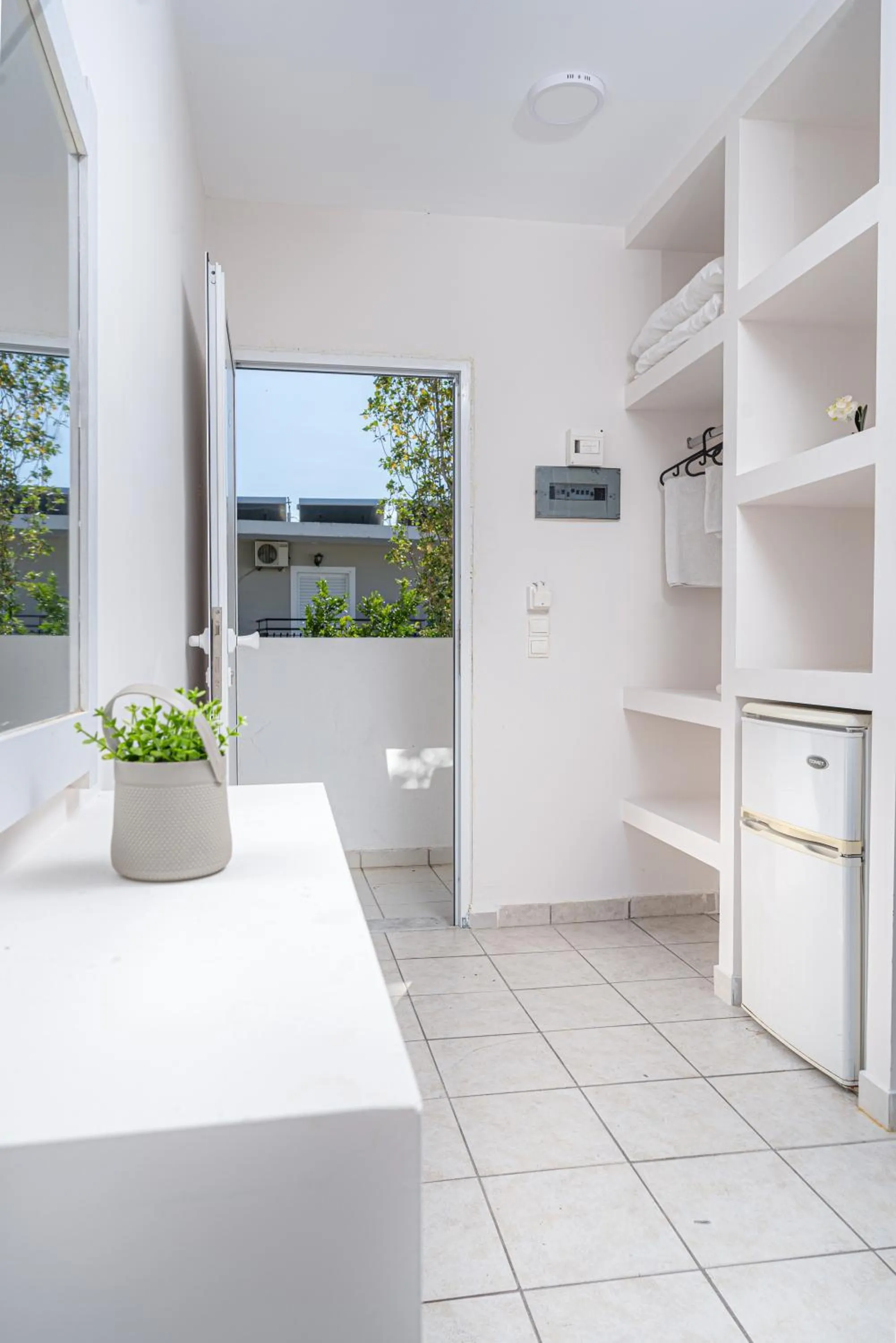 Bed in Blue Palm Hotel