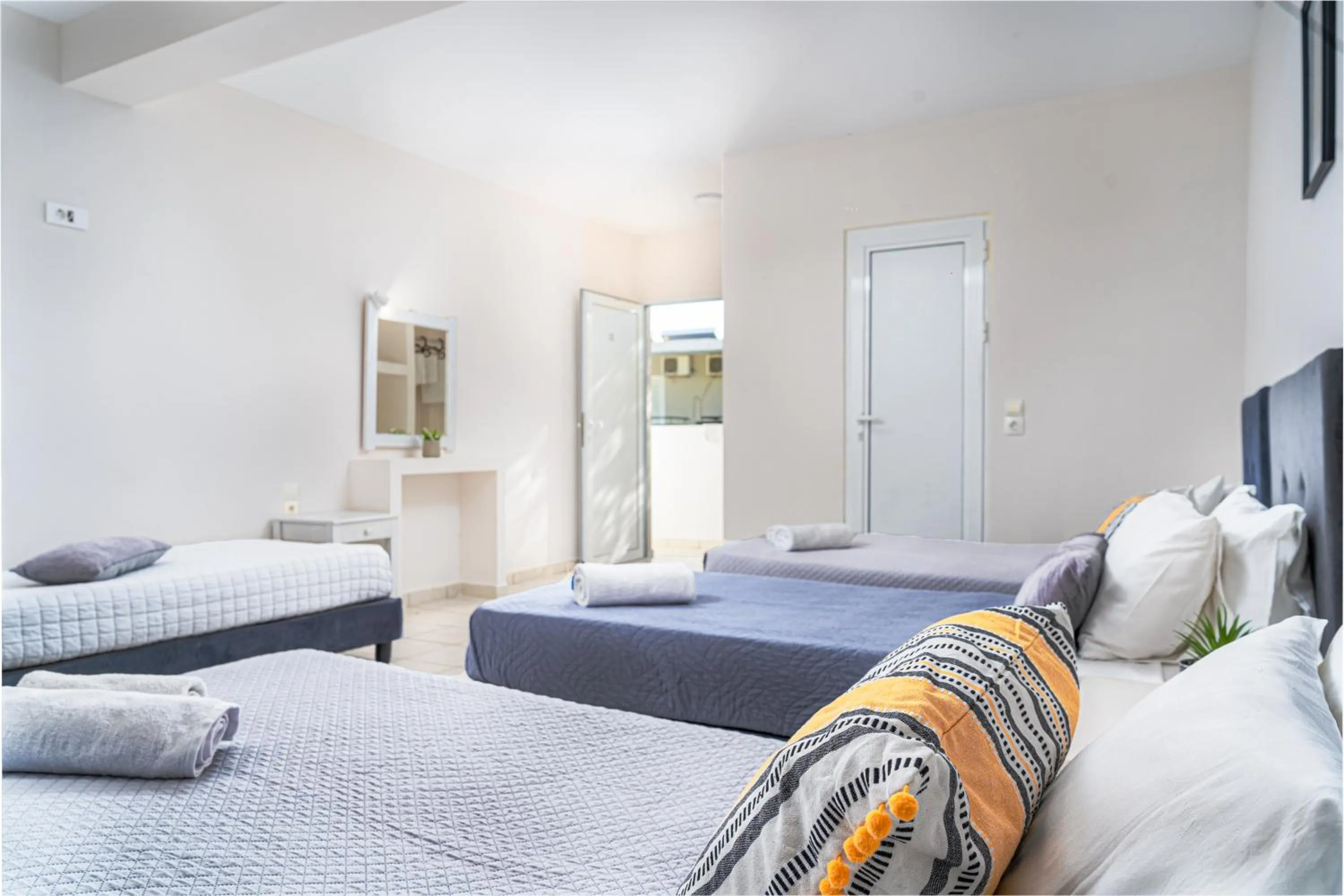 Bed in Blue Palm Hotel