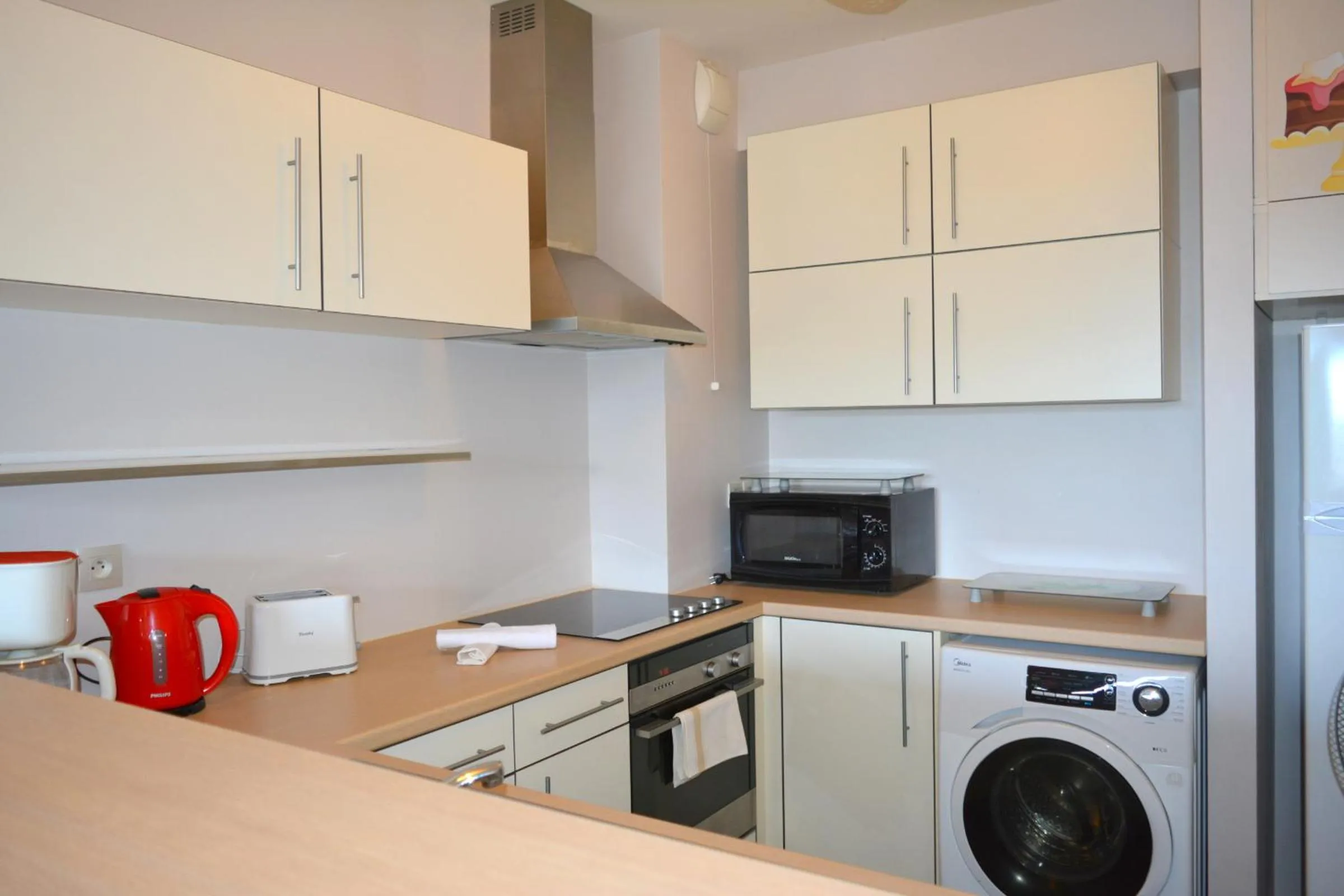 Kitchen or kitchenette in Moana Studio - downtown Papeete - WiFi AC Netflix parking - 3 people