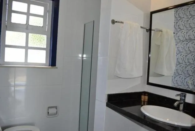 Toilet in Pousada Maria Farinha