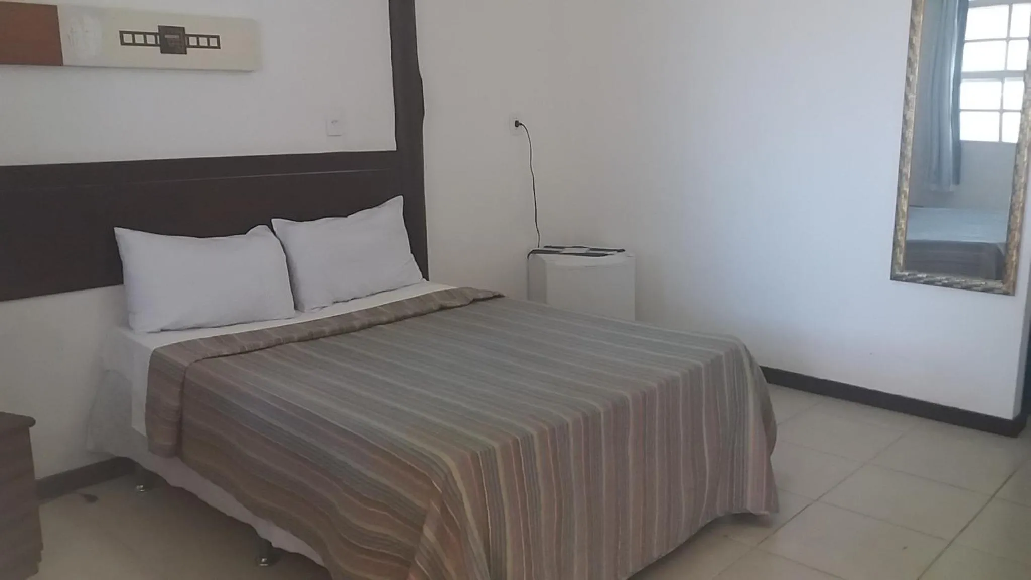 Bed in Pousada Maria Farinha