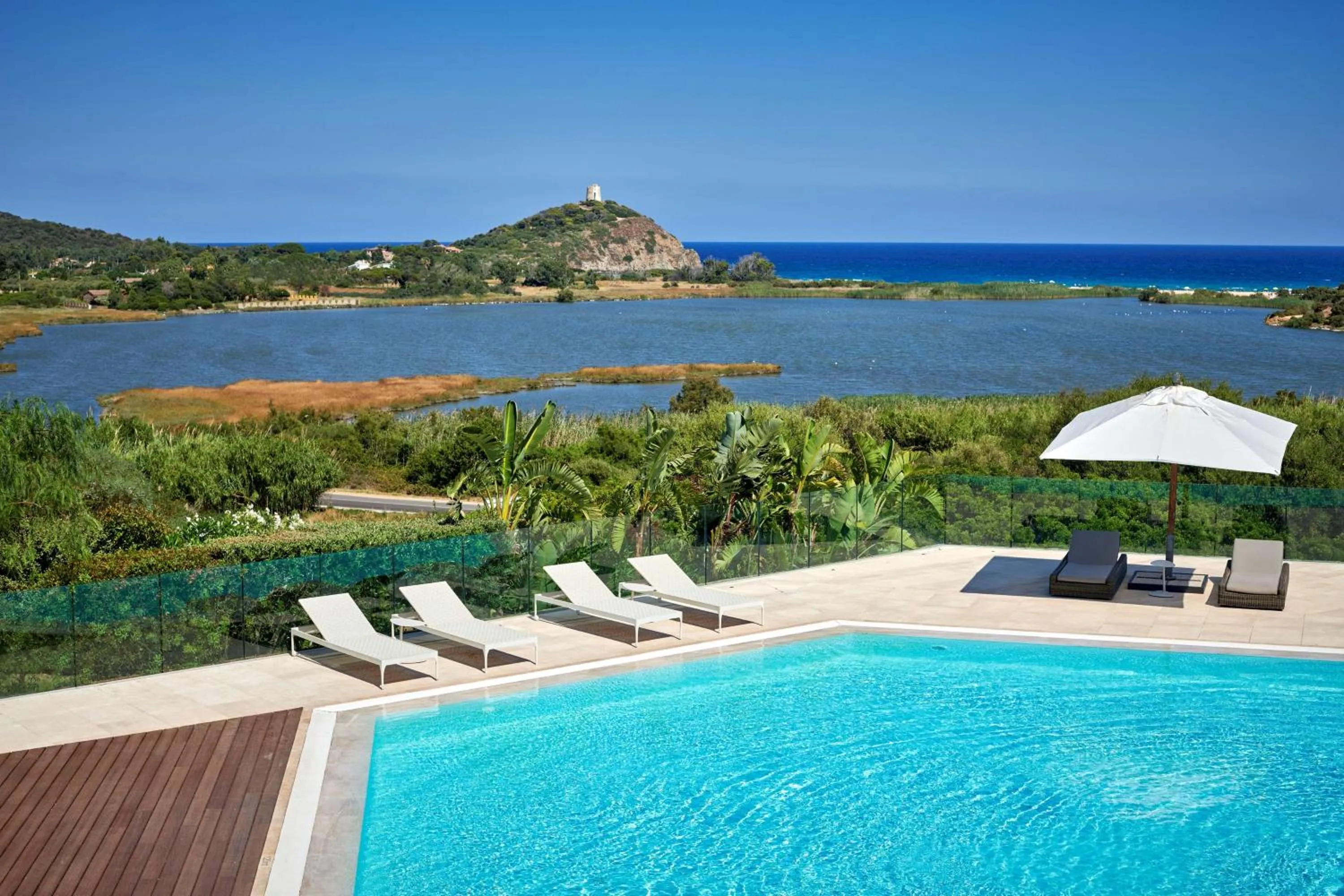 Pool view in Conrad Chia Laguna Sardinia