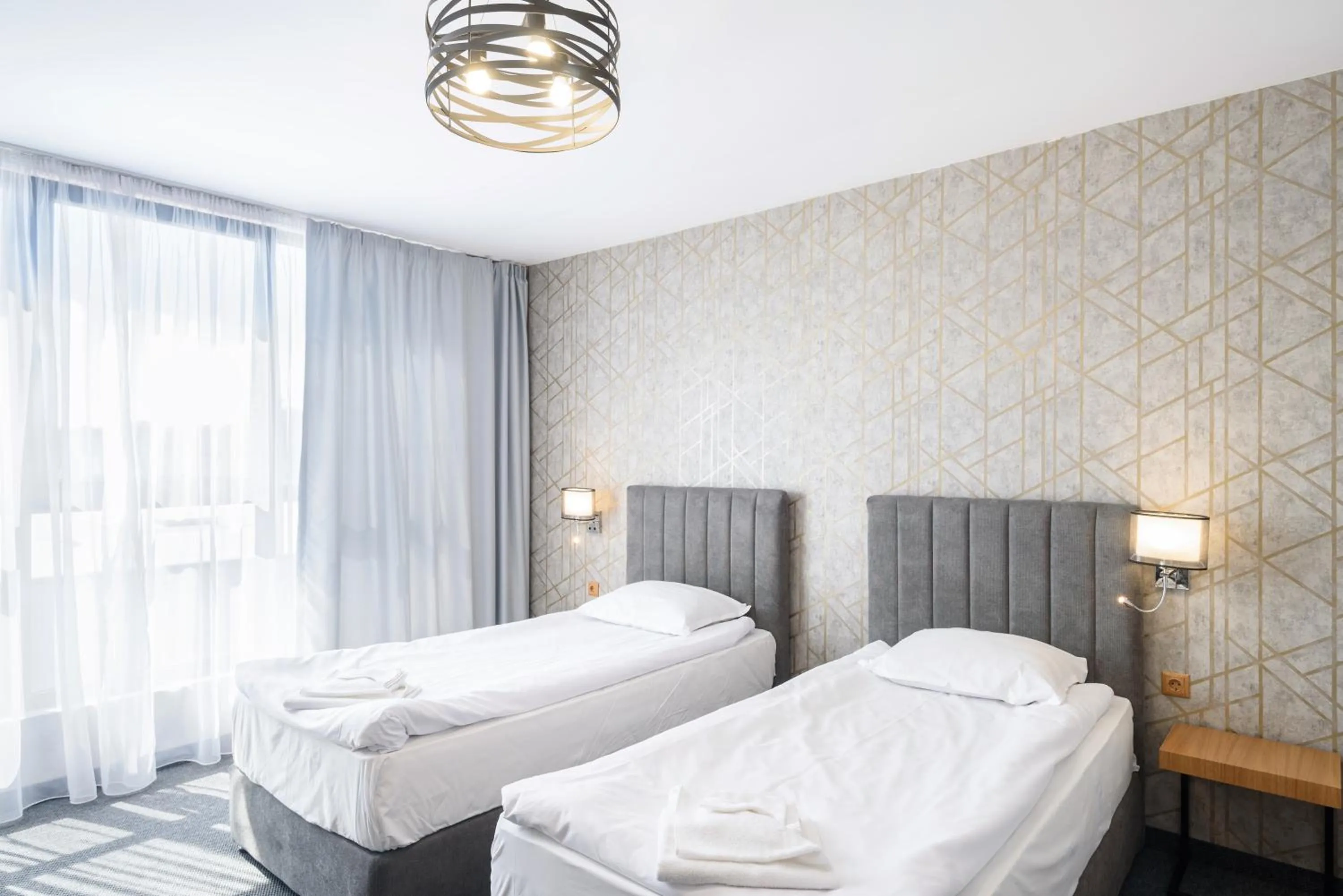 Bed in Avenue Hotel Deluxe