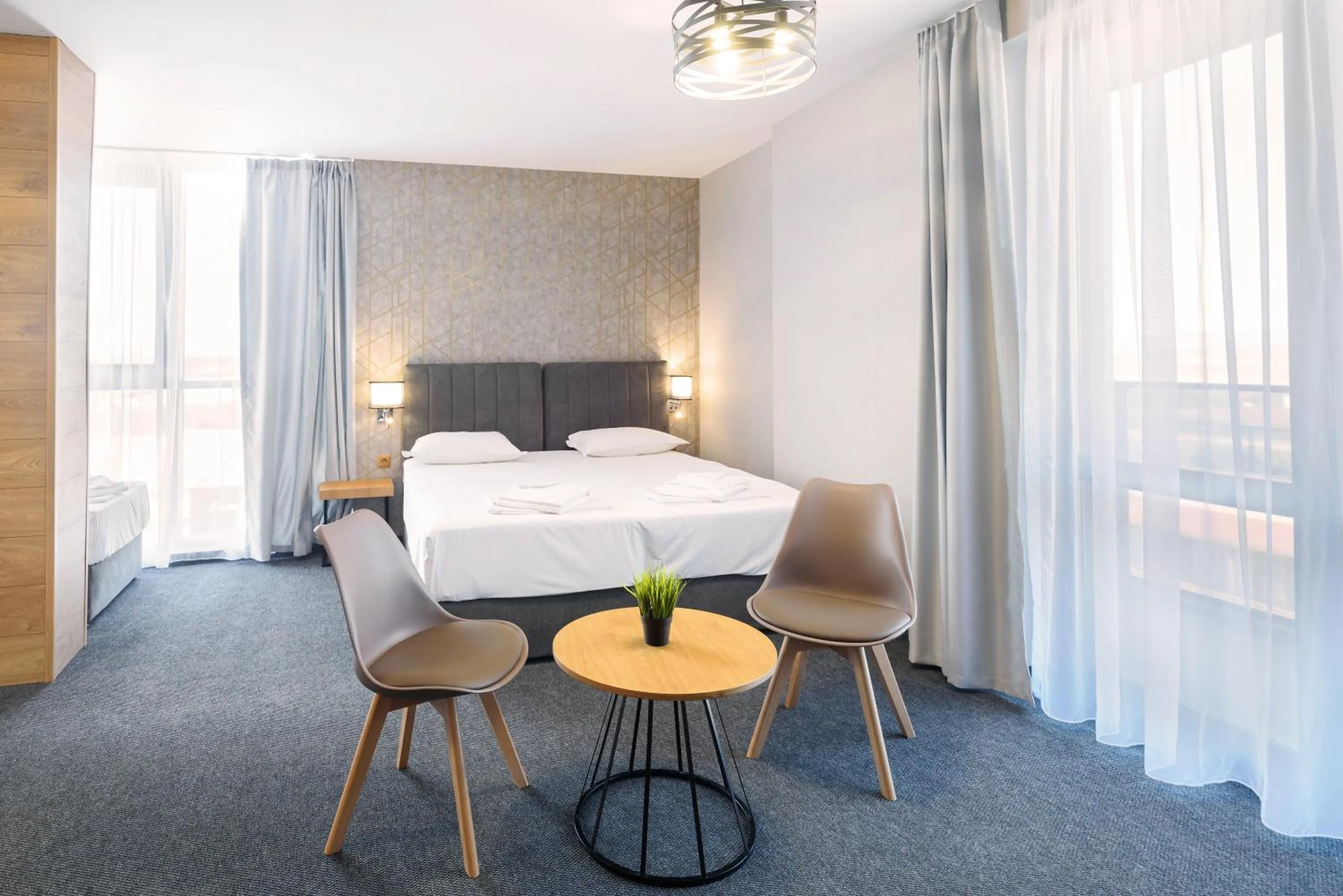 Bed in Avenue Hotel Deluxe