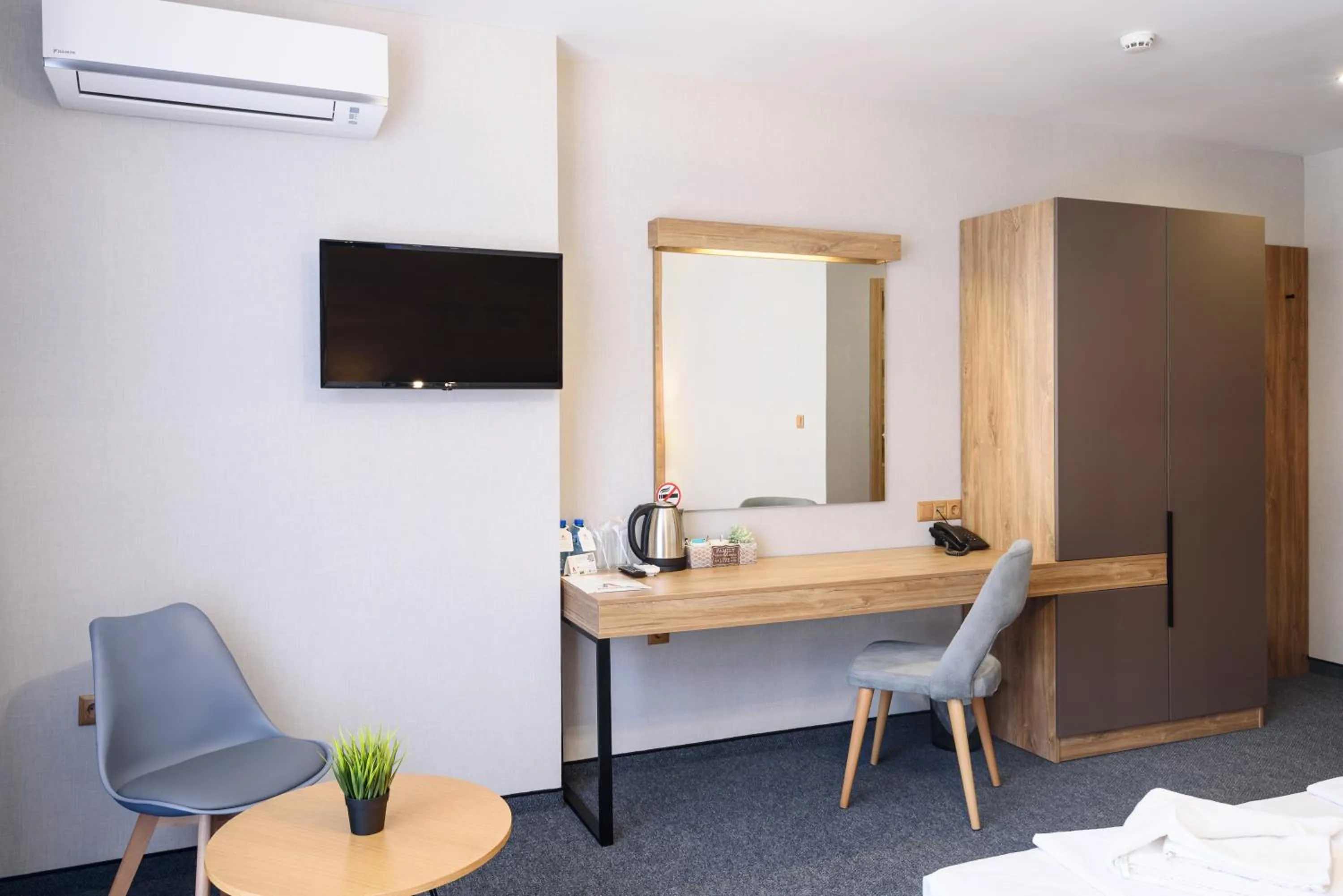 Bed in Avenue Hotel Deluxe