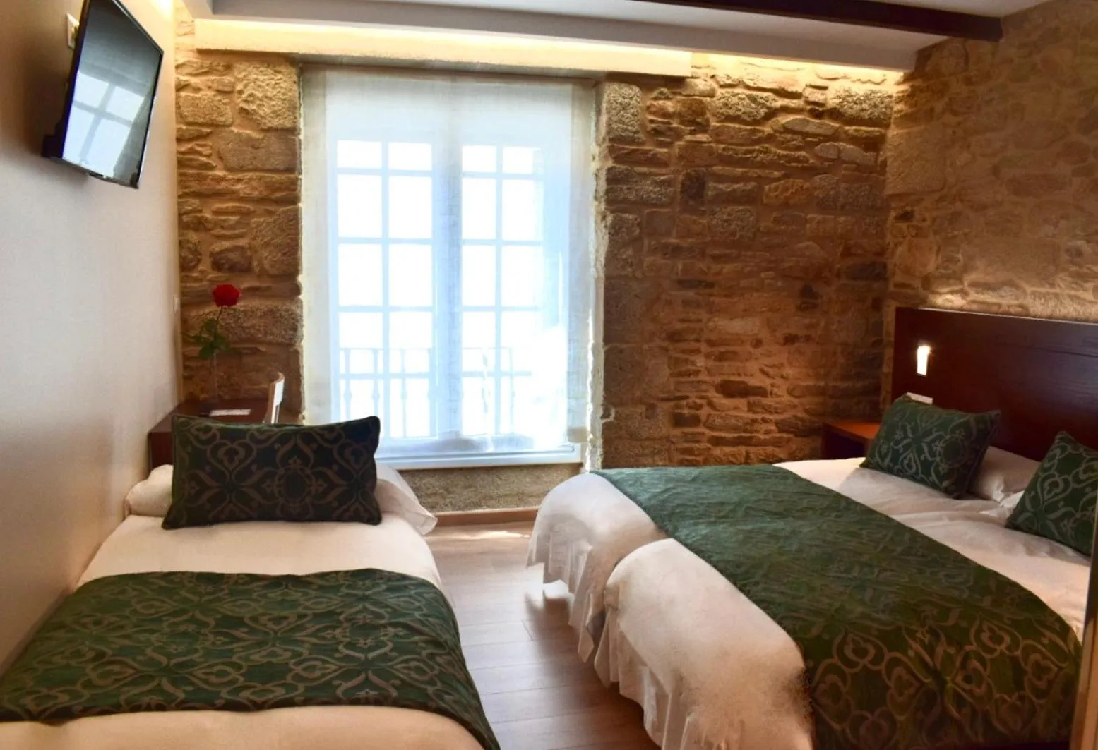 Photo of the whole room, Bed in Mapoula PR Boutique