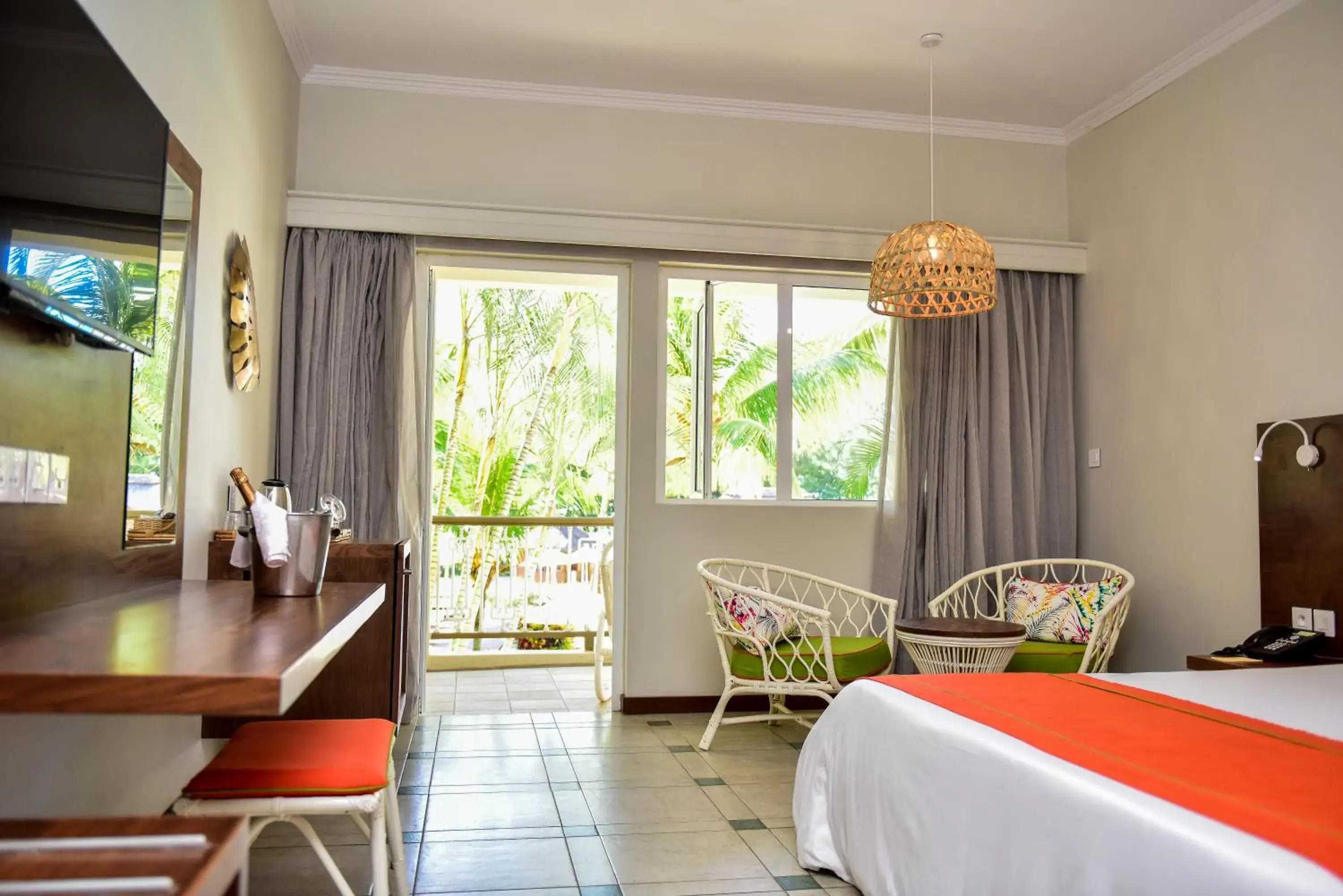 Seating area, Bed in Tarisa Resort & Spa Seating area, Bed in Tarisa Resort & Spa