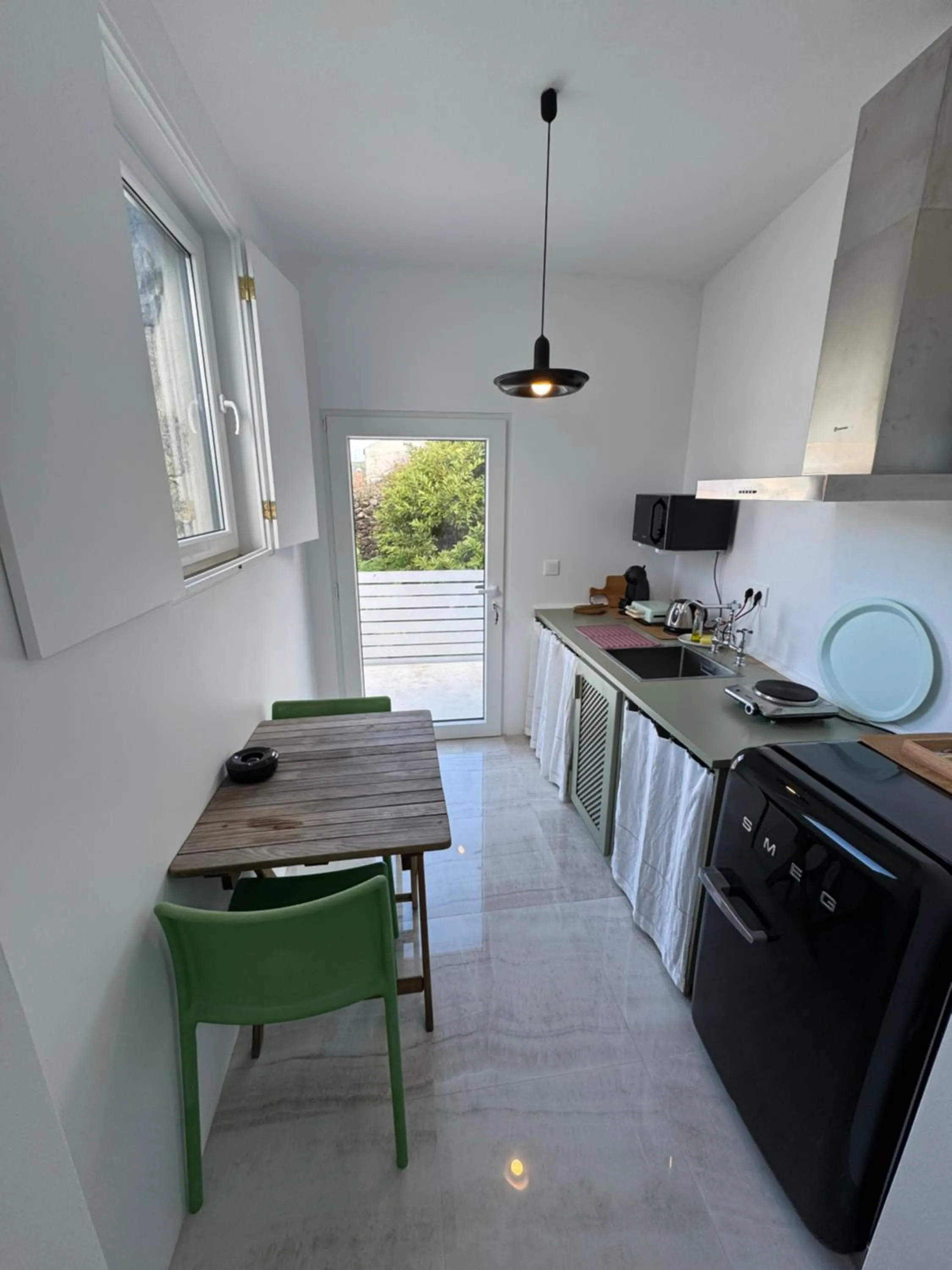 Kitchen or kitchenette in Baía das Caldeirinhas