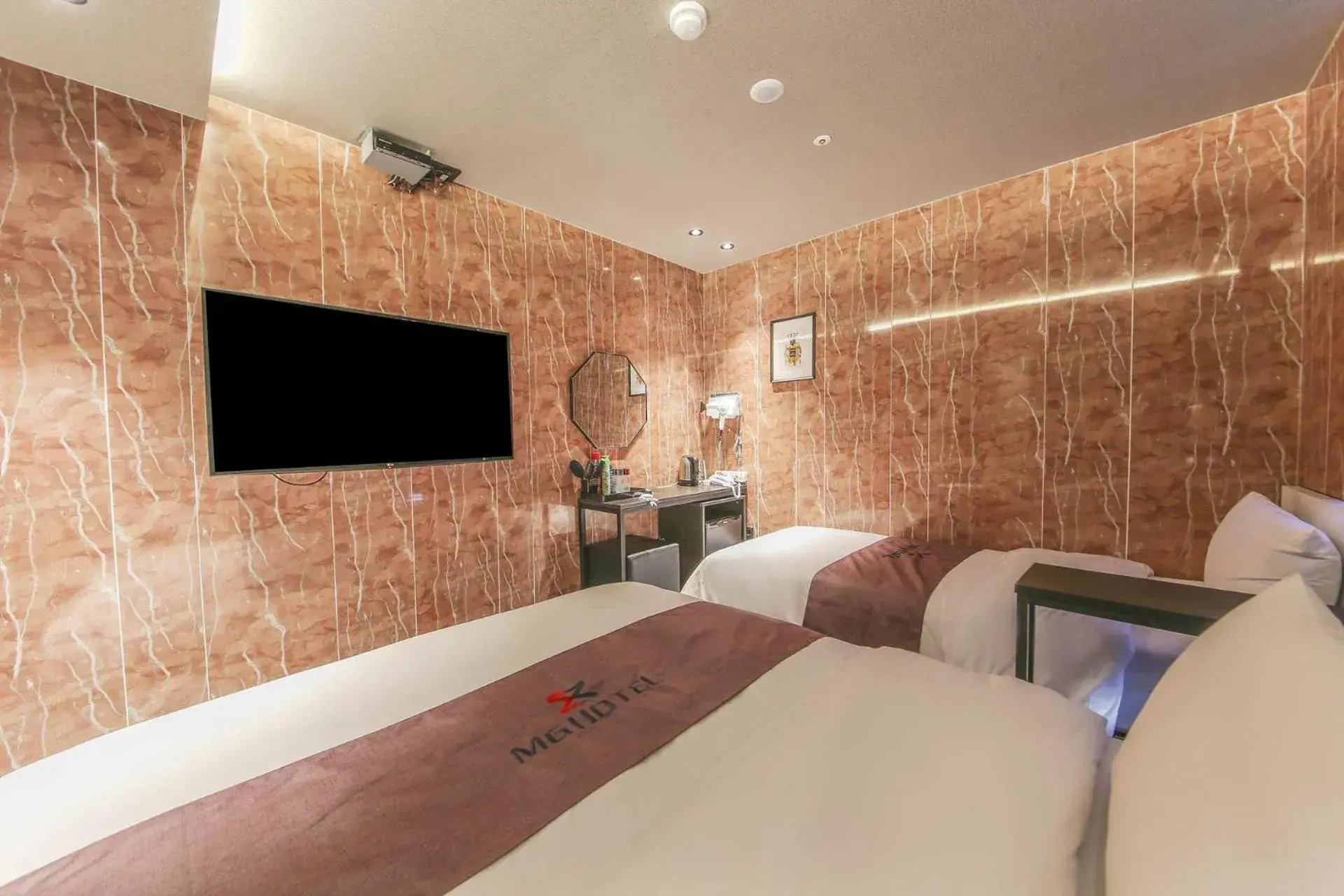 Photo of the whole room, Bed in MG Hotel Photo of the whole room, Bed in MG Hotel