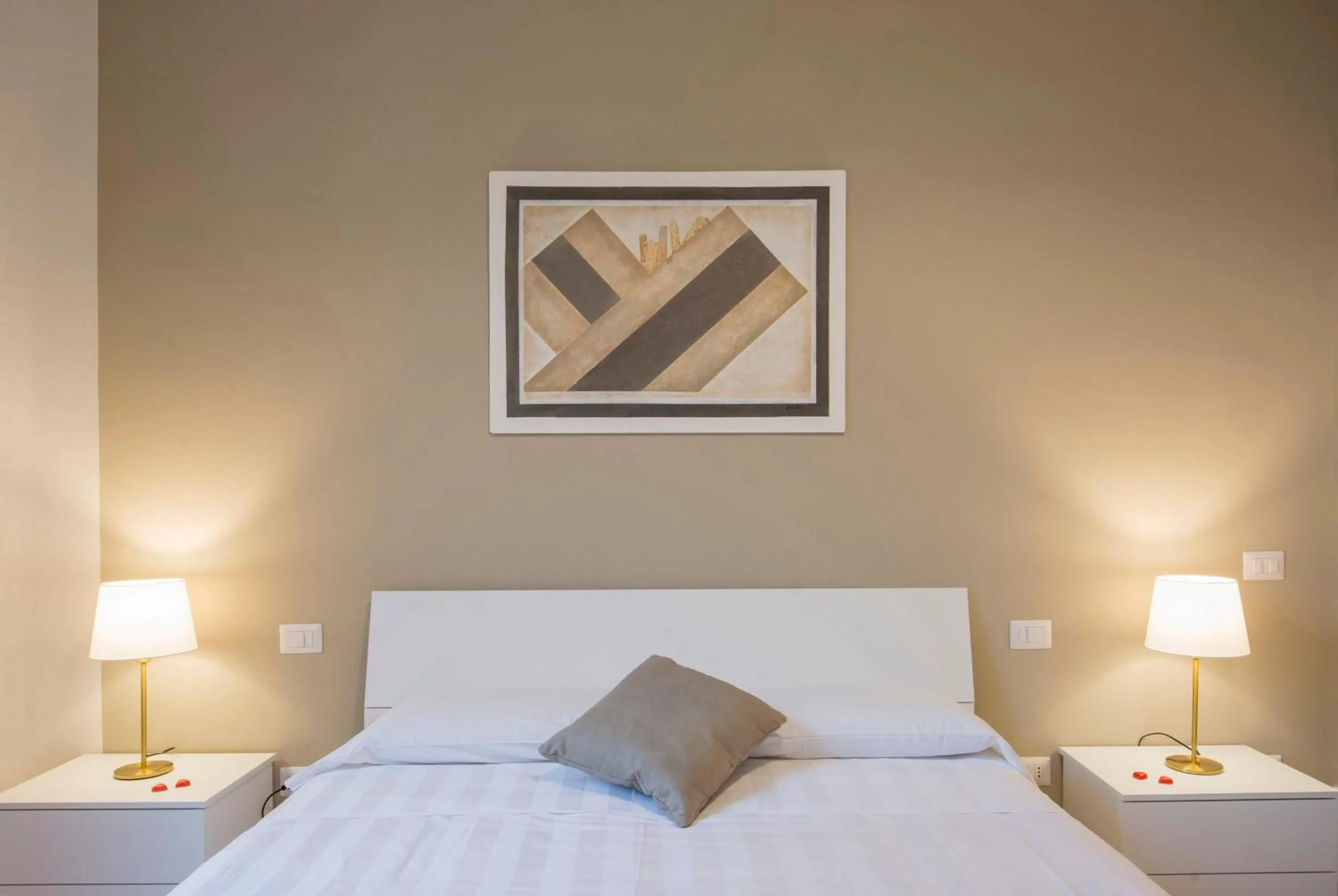 Photo of the whole room, Bed in Regis Condo