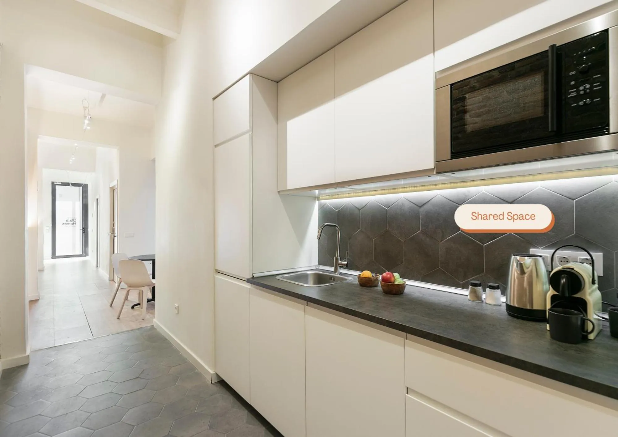 Communal kitchen in Arte Suites by Olala Homes